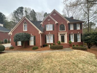 Exterior Painting and Trim Refresh for Suwanee Brick Home