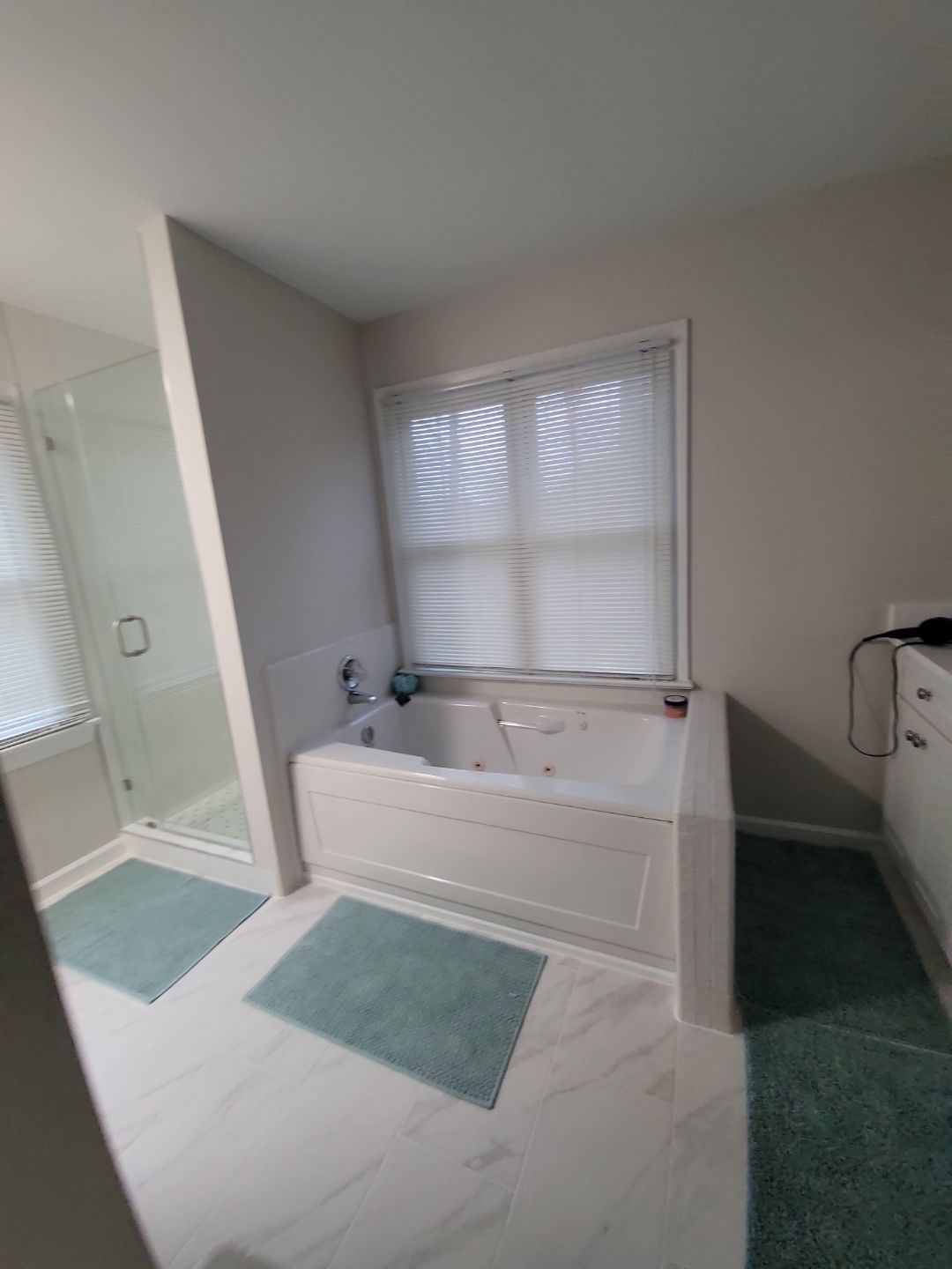 From Cramped & Carpeted to Bright & Modern: A Cary Bathroom Transformation by Elite Remodeling and Design LLC