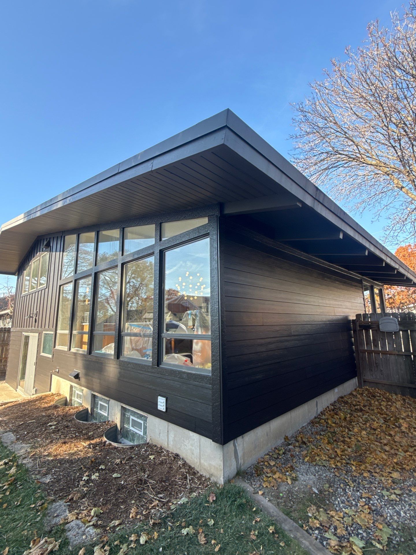 East Grand Rapids James Hardie Siding Remodel by Cutting Edge Homes