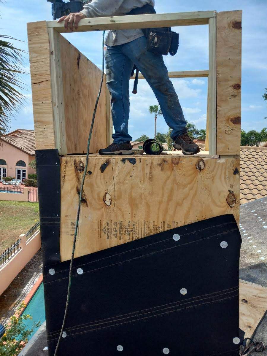 Complete Chimney Rebuild + Tile & Flat Re-Roof  by Morton Roofing, Inc.