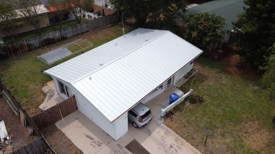 Residential Roofing Installation using 1" Nail strip metal roof