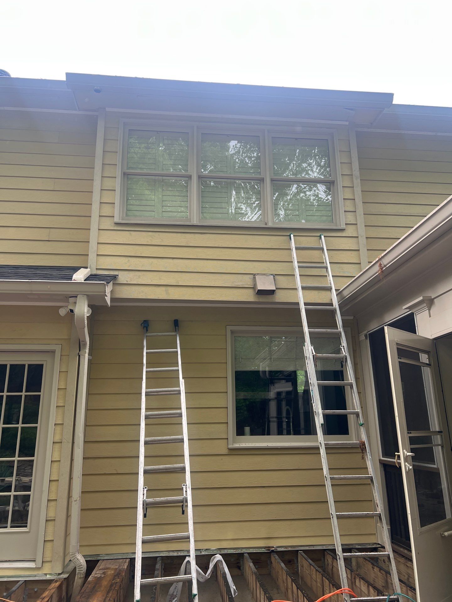 James Hardie Siding Install, Rotten Wood Replacement, Trex Deck Resurface, and Exterior Paint Project in Roswell, GA by Nelson Exteriors 