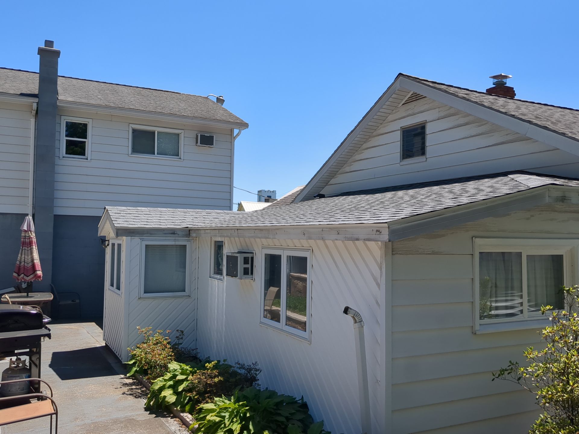 Shingle Roof Replacement and Seamless Gutter Installation in Lavelle by Esh Builders