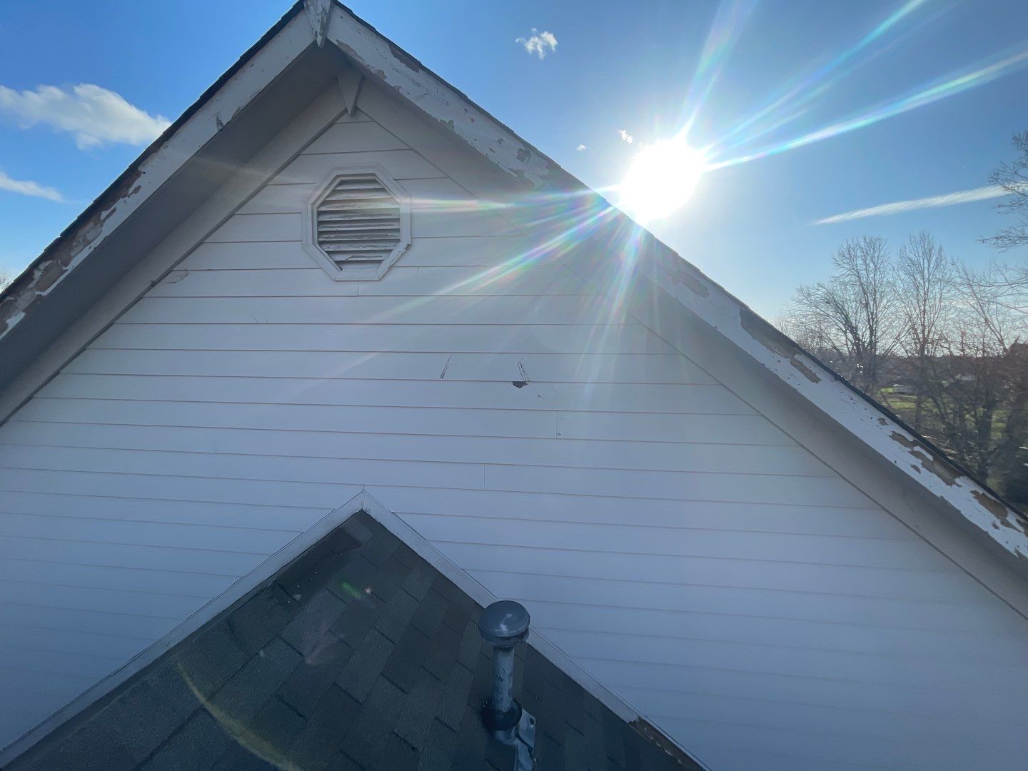 Tornado damage in Whiteland. Roof replacement, James Hardie siding, exterior paint, gutters, windows, doors by 317 Roofing & Restorations