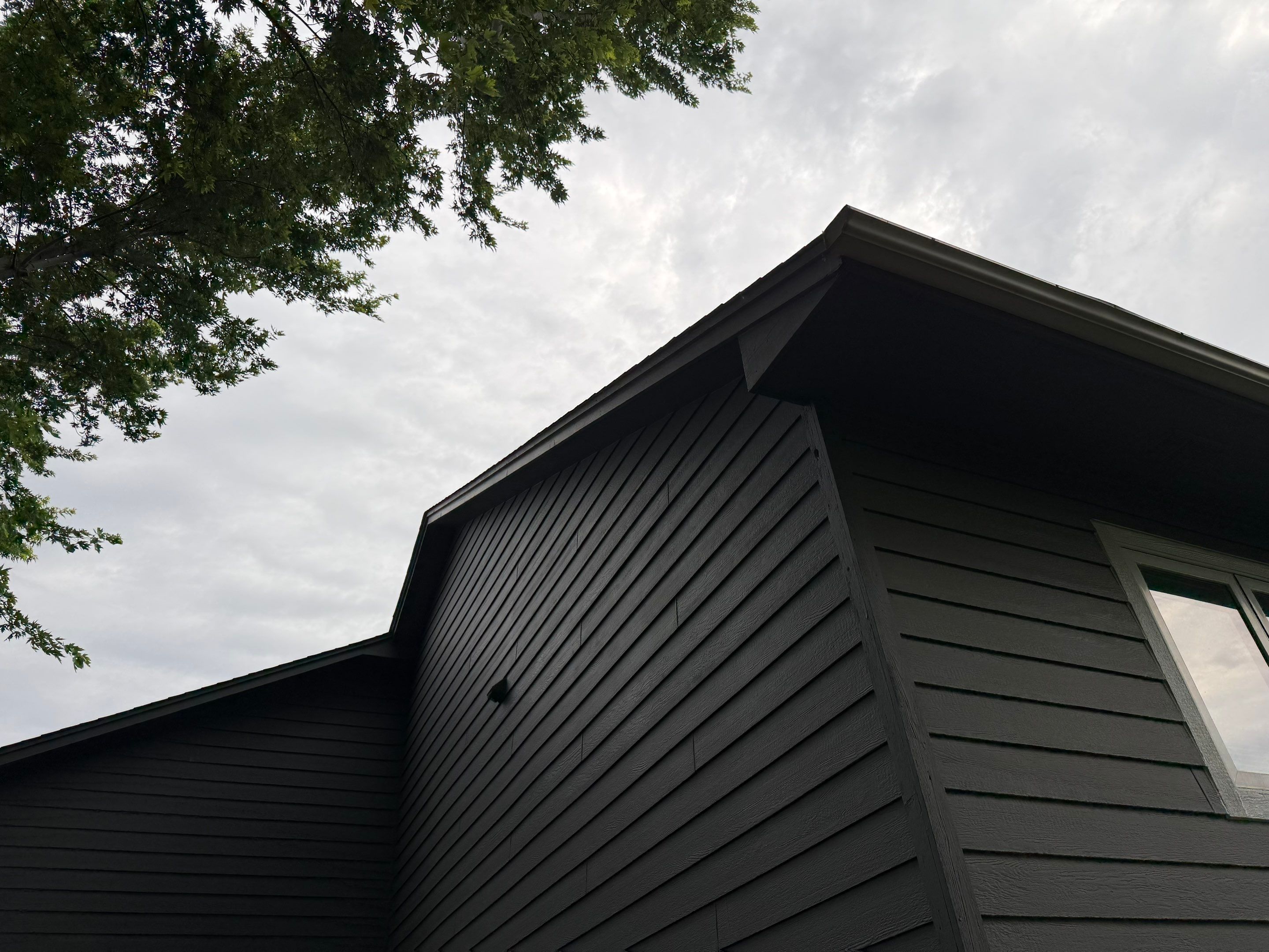 Full Exterior Painting for Gray Siding and Trim in Sioux Falls by Select Painting, Coatings & Garage Cabinets