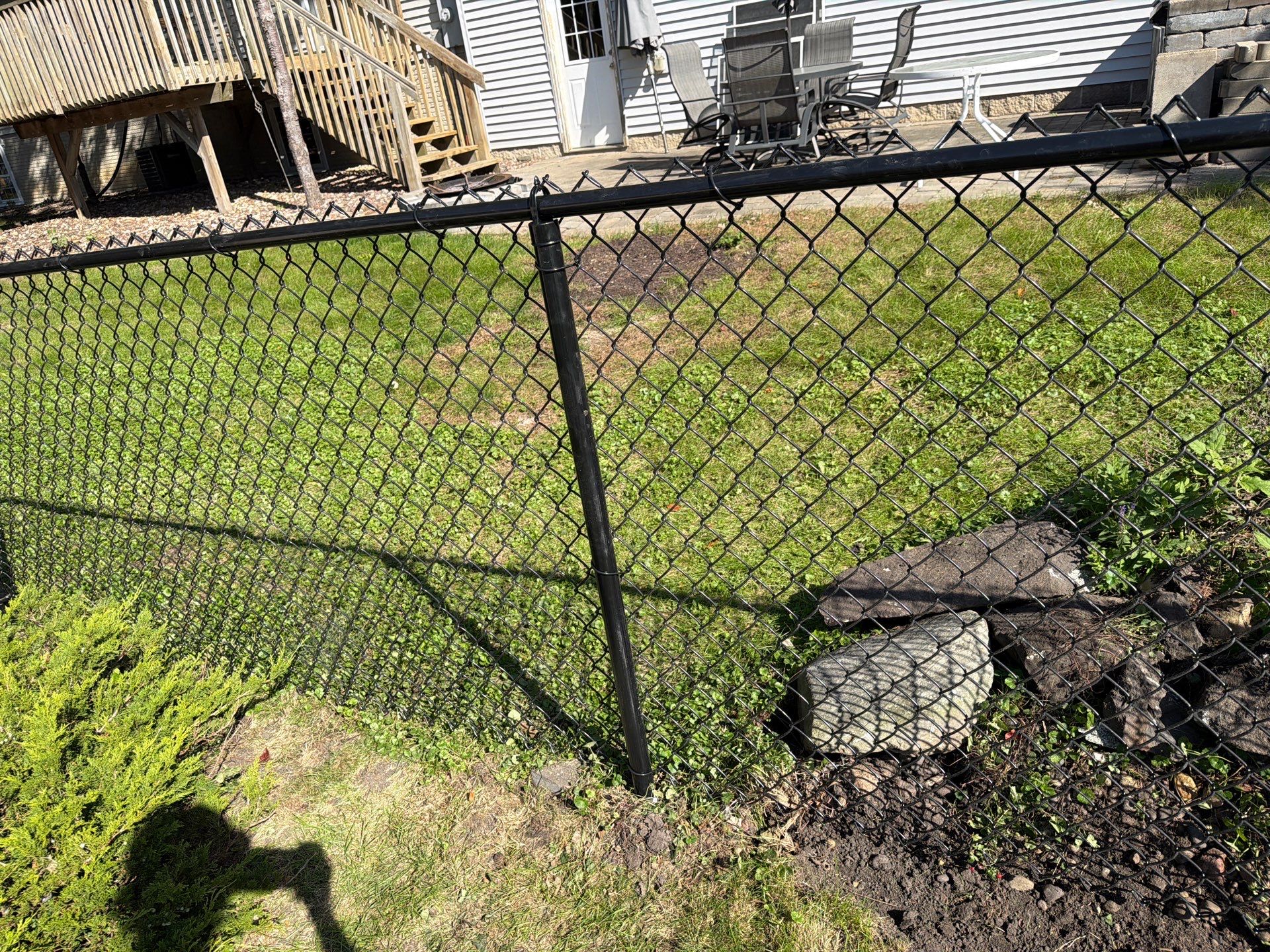 Custom Vinyl Privacy and Black Chain Link Fence Installation in Cedar Falls by Perfect Picket Fence and Stain
