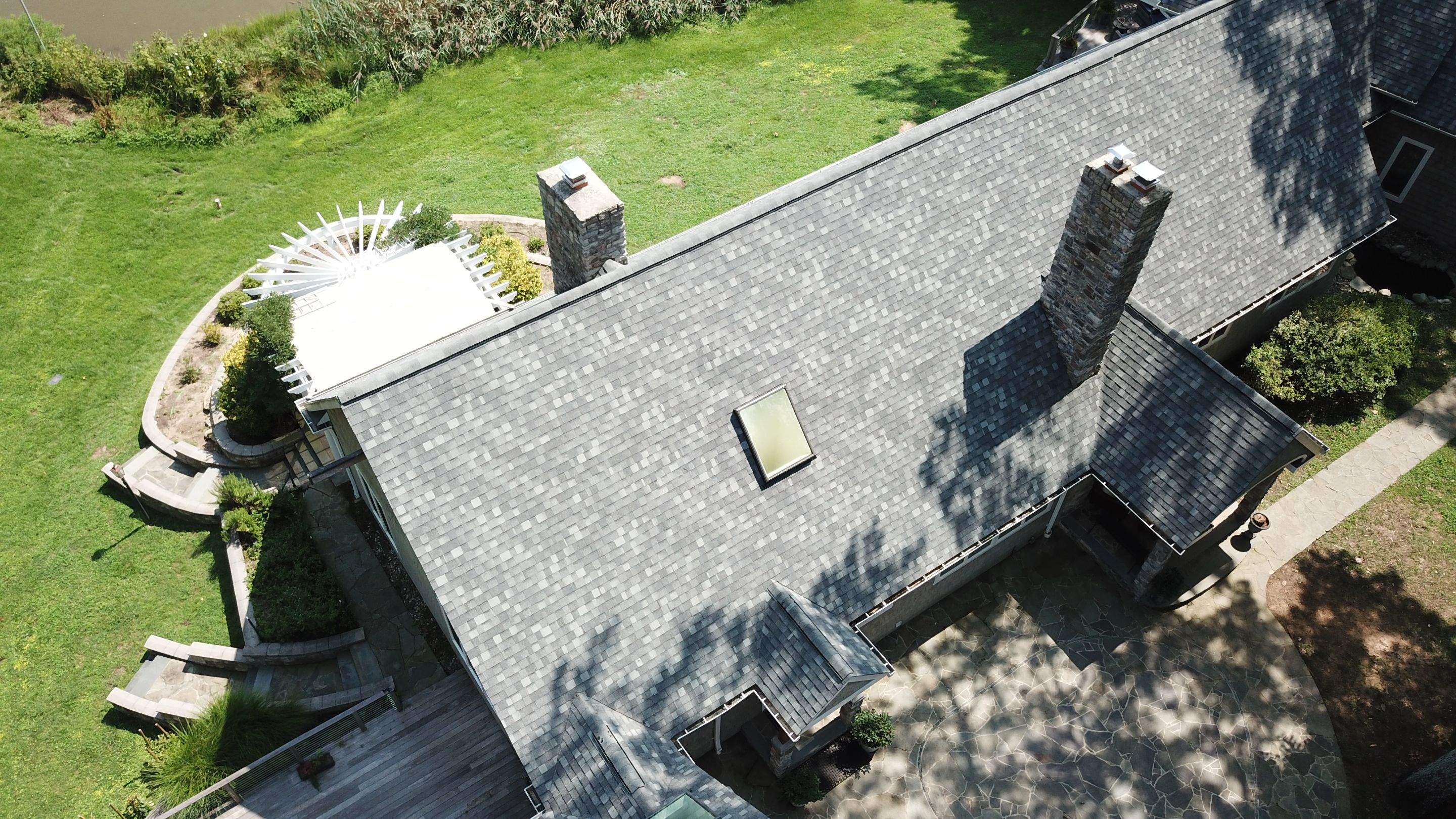 Roof Replacement using IKO Dynasty by American Home Contractors