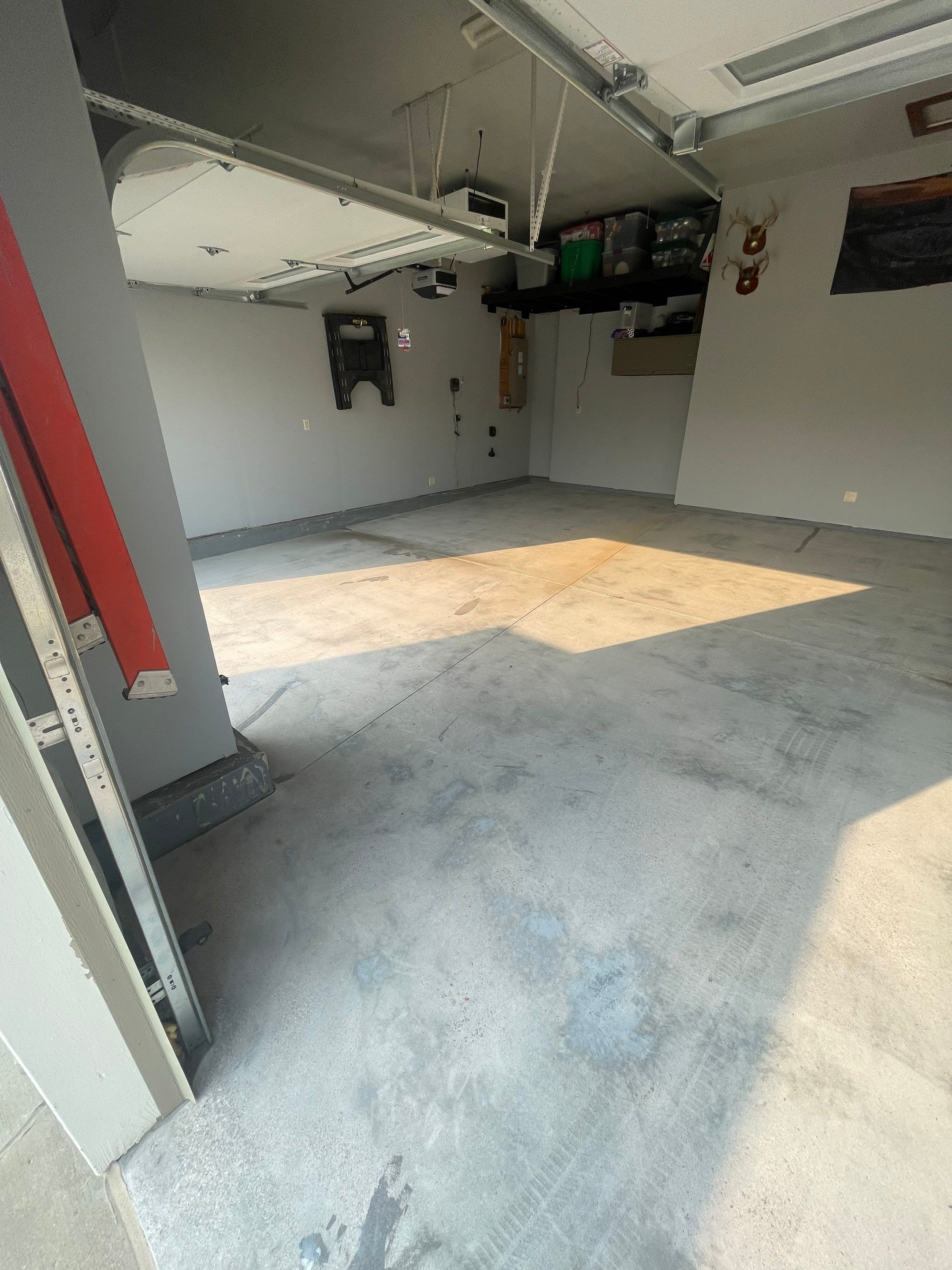 Sioux Falls Garage Concrete Coating Installation with Domino Flake by Select Painting, Coatings & Garage Cabinets