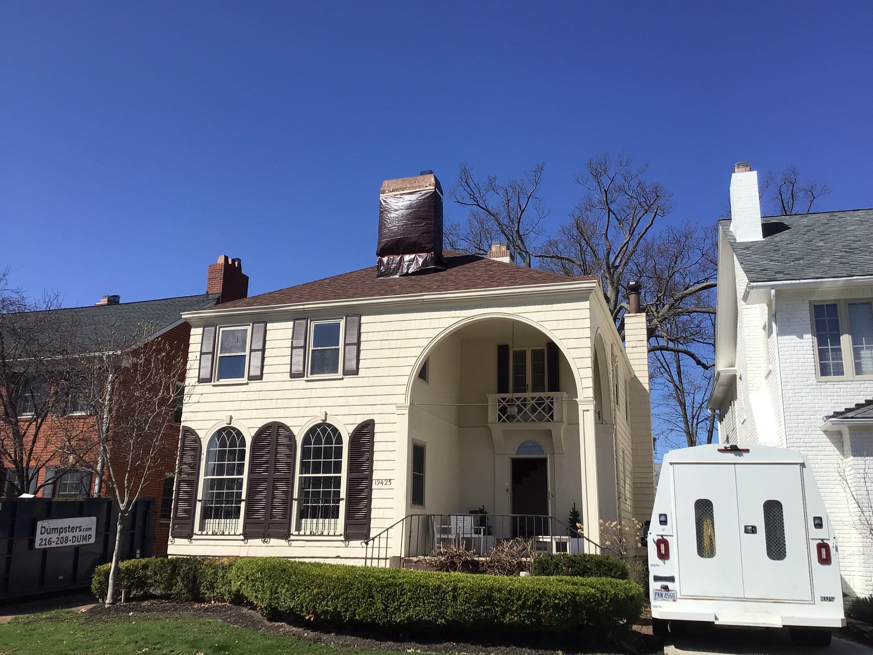 Residential Roofing Installation, Dec-tek walk-out porch roof, siding on garage by Absolute Roofing and Construction