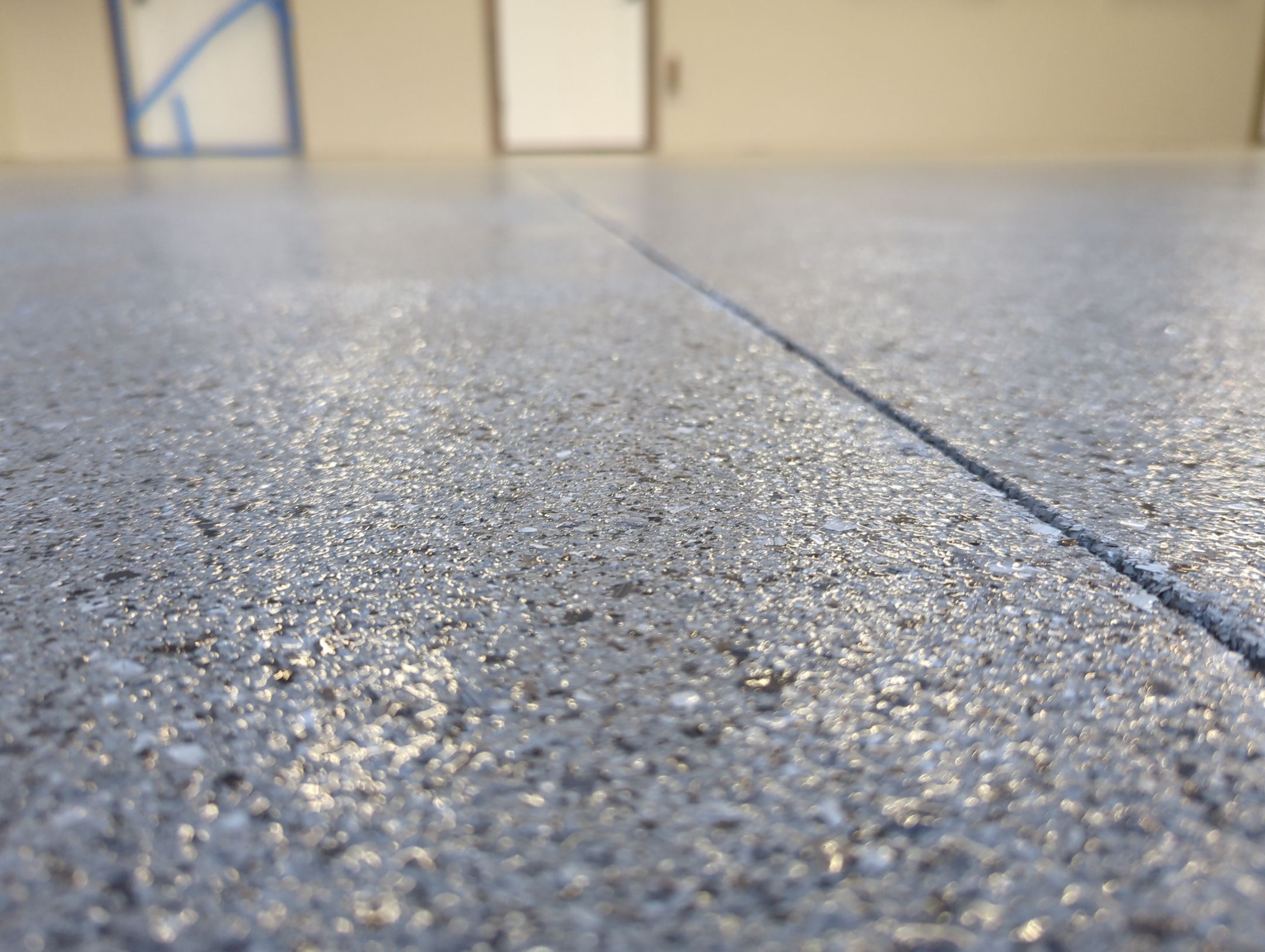 Garage Transformation using Battleship Hybrid by Croc Coatings, LLC