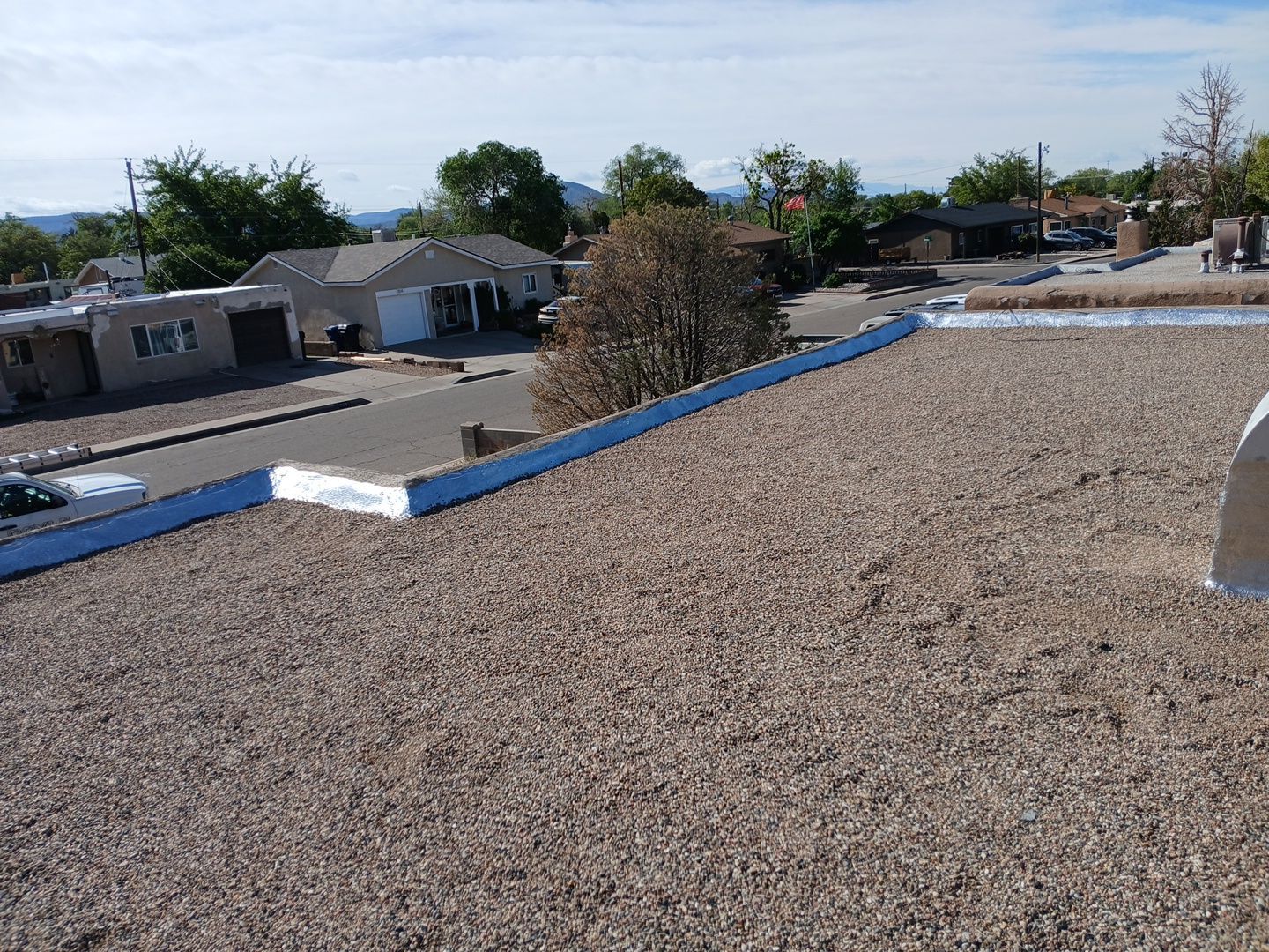 Albuquerque Flat Roof Replacement Using Tan Modified Bitumen Membrane by Doyle Roof Masters Inc