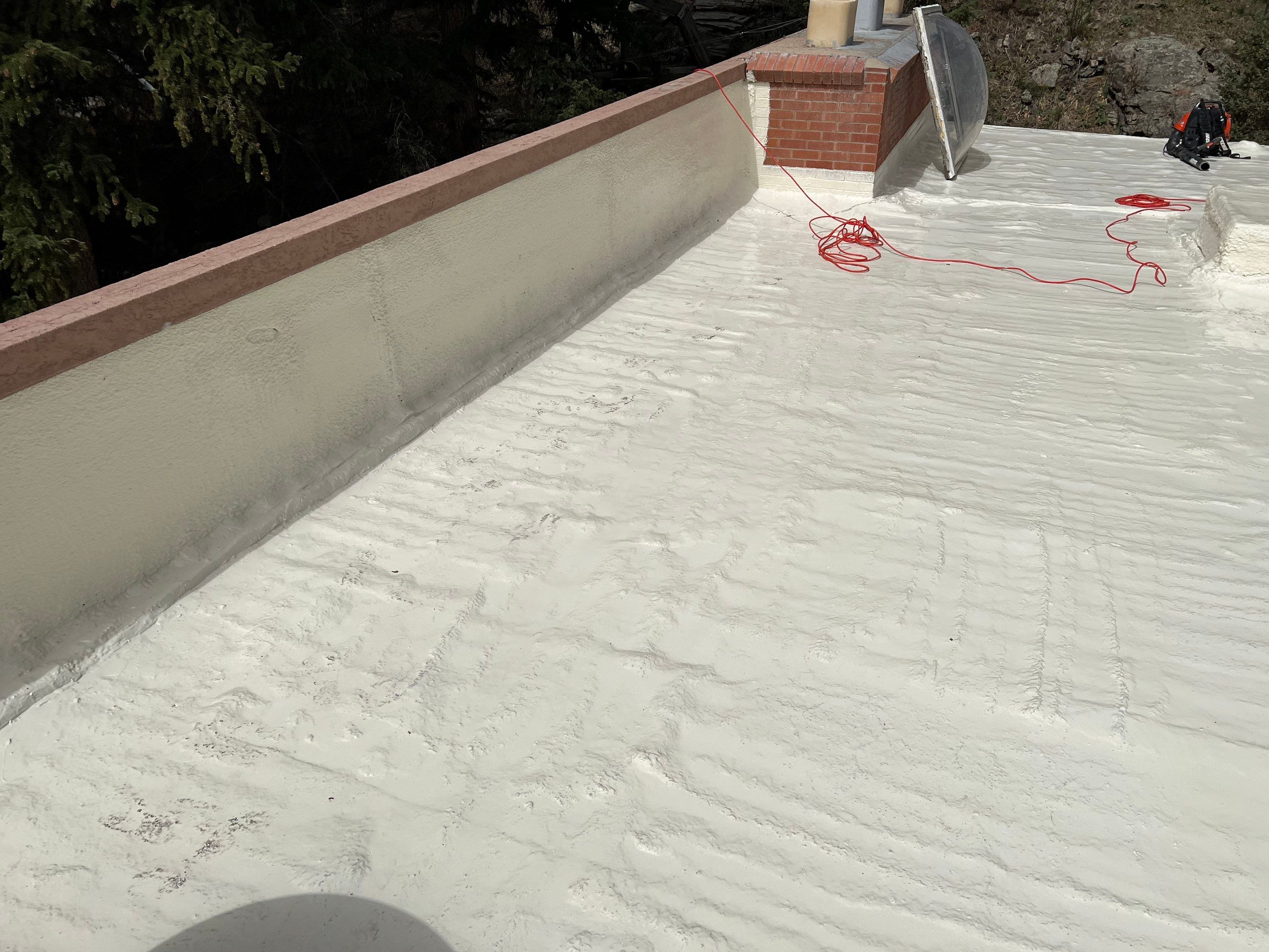 Commercial Roofing Installation using CASTAGRA ECODUR COATING by A to Z Roofing