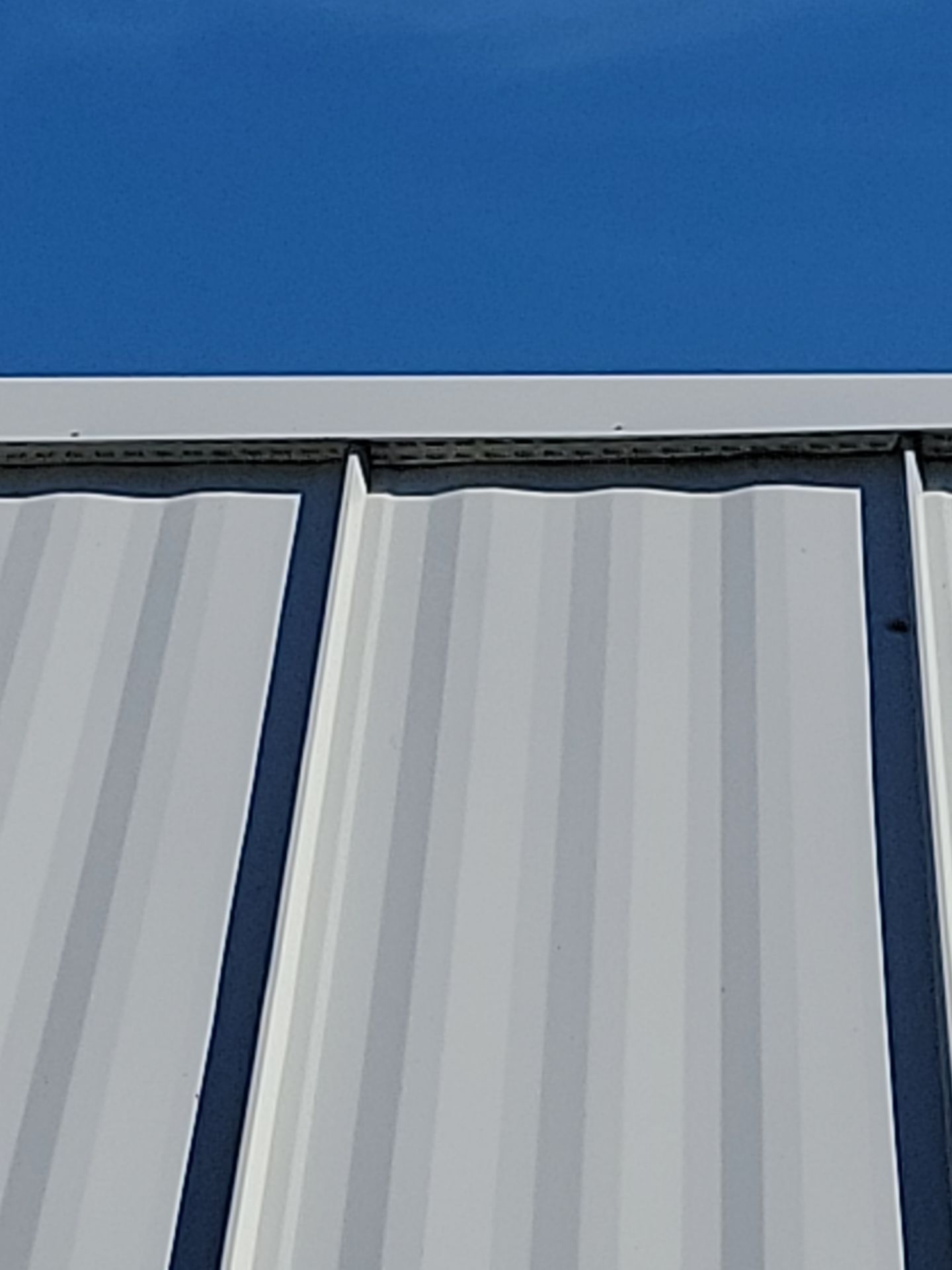 Residential Roofing Installation using Aluminum Metal Roof by Galaxy Builders, Inc.