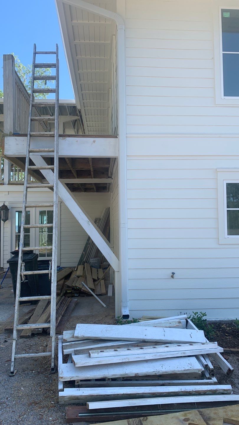 Seamless Gutter Installation Using White K-Style Aluminum Gutters by Gutter Professors