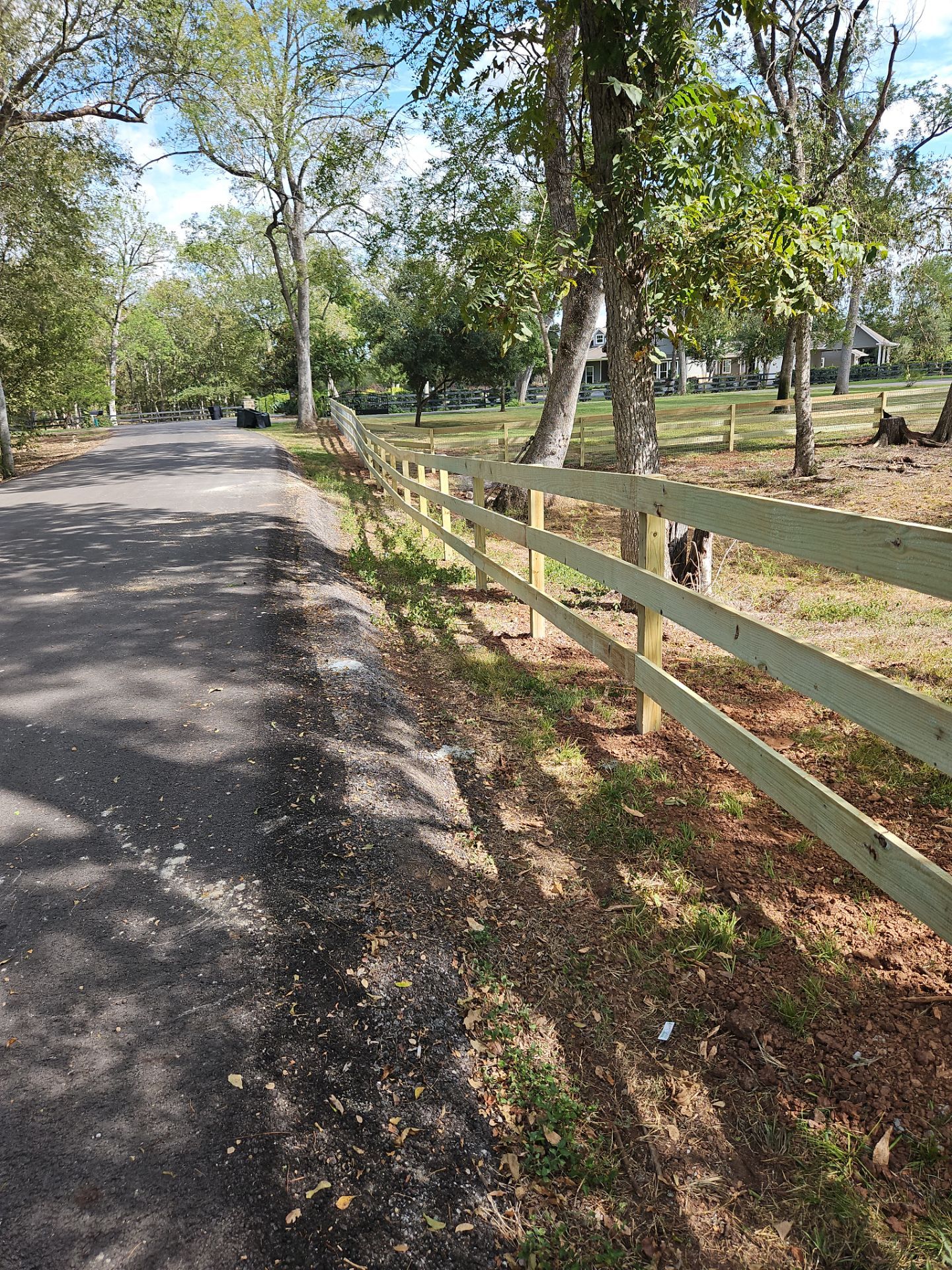 Ranch Style fence Plus Iron installation by Tim's Fences