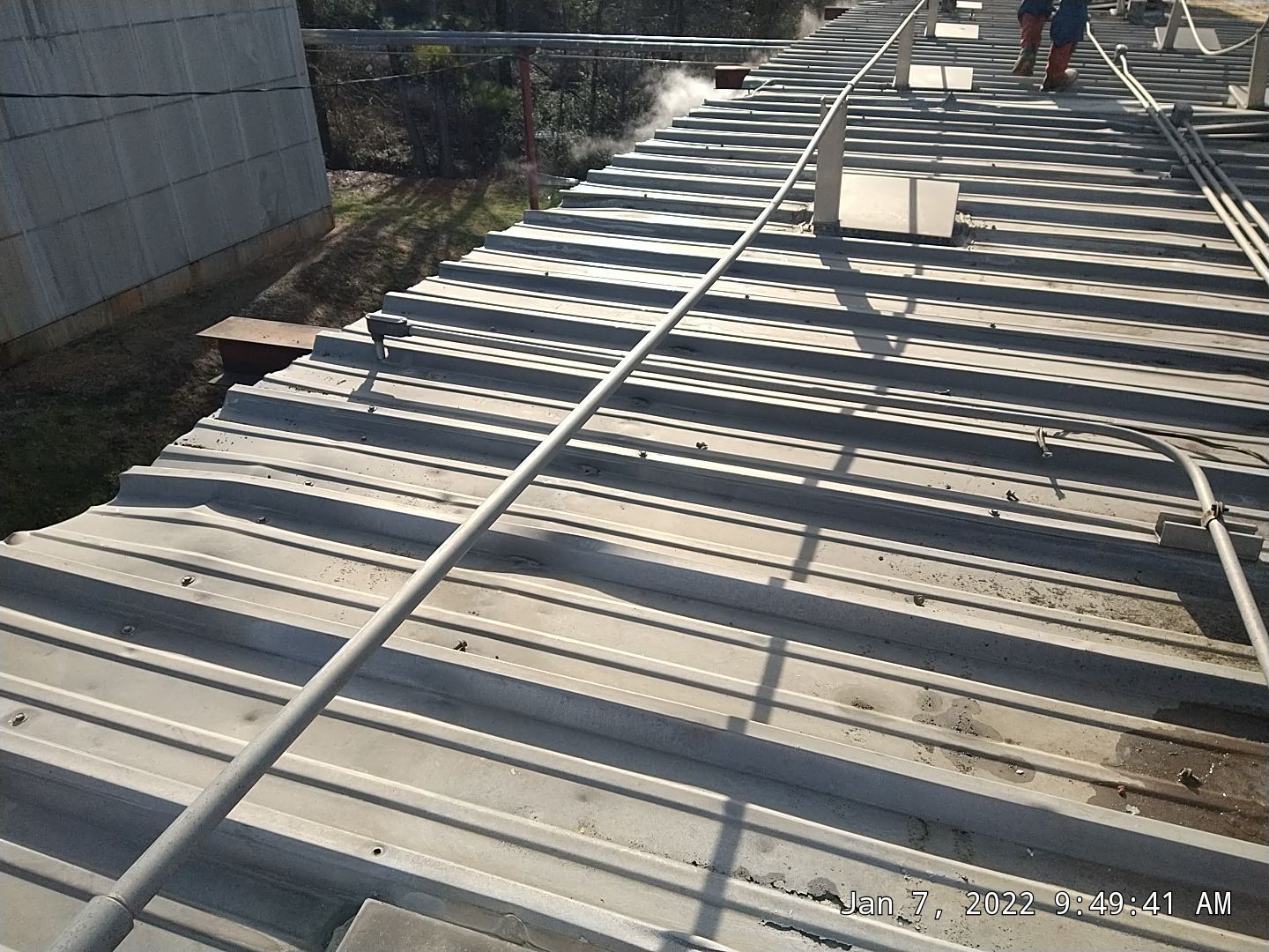 Commercial Roofing Installation using Aluminum Roofing panels by Hostetler Roofing