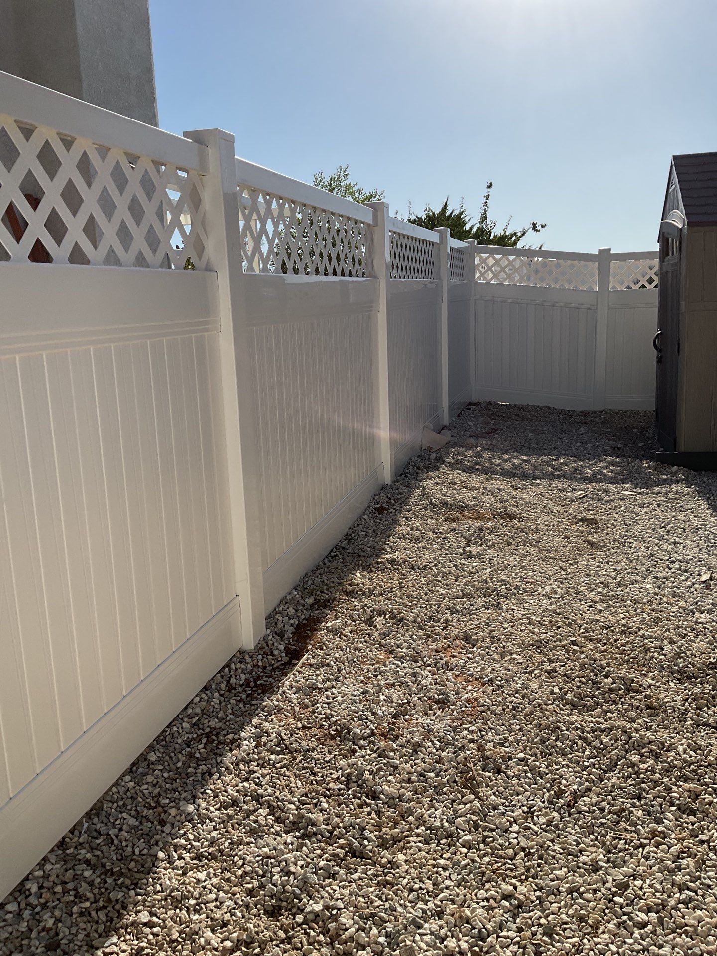 Lattice Vinyl with Privacy Vinyl Fence by Fence Guys Inc.
