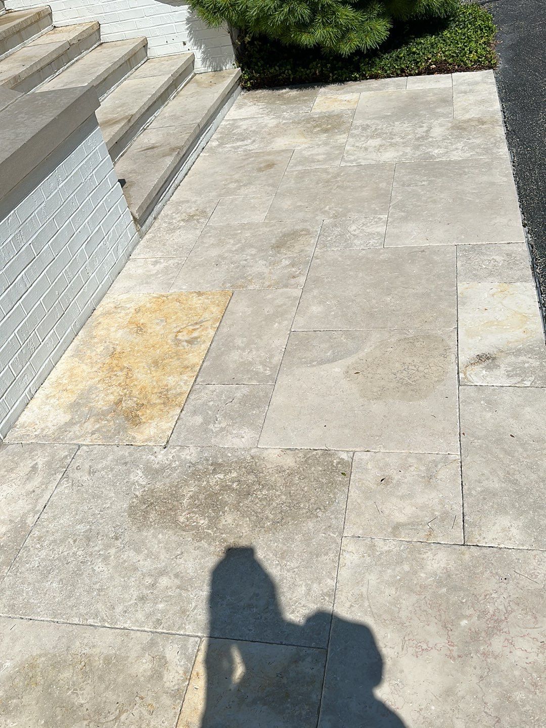 marble patio cleaning and sanding using Polysweep polymeric sand by Northern Power Washing LLC.