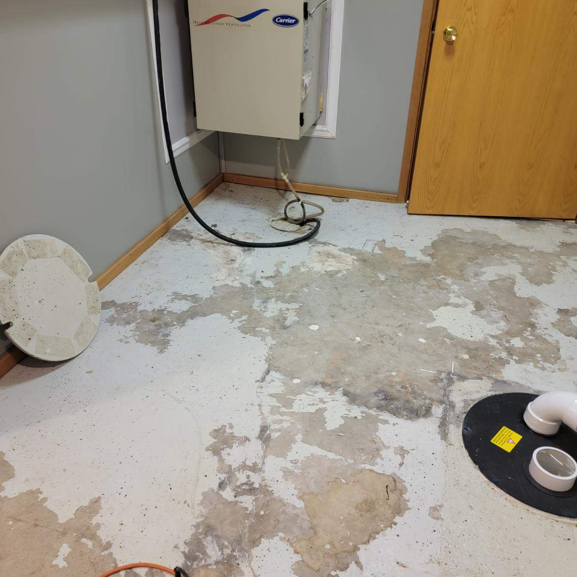 Full Garage and Basement Epoxy Floor Coating in Winner by Select Painting, Coatings & Garage Cabinets