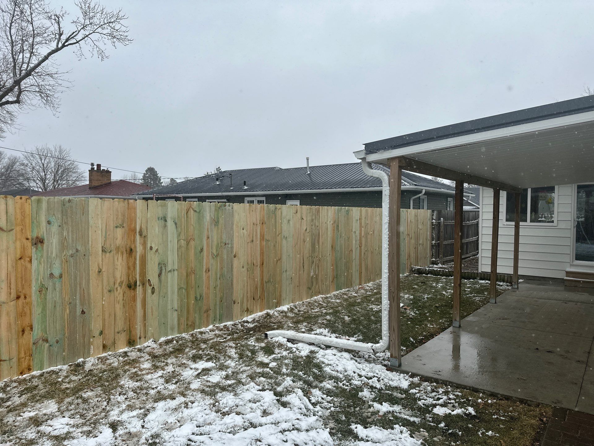 Pressure-Treated Wood Privacy Fence Replacement in Waterloo by Perfect Picket Fence and Stain