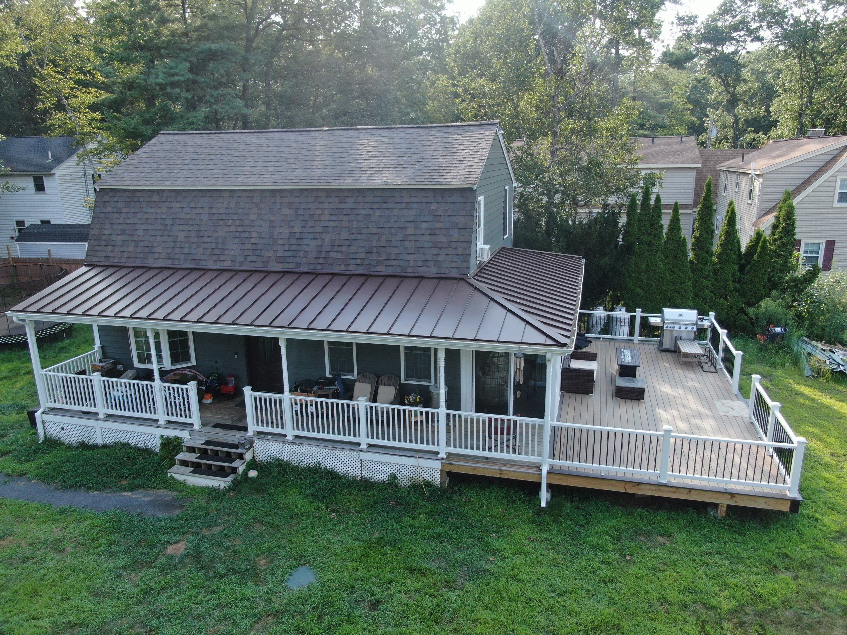 Full Roof Replacement & Farmers Porch Restoration – Asphalt + Standing Seam Metal by Mighty Dog Roofing of Greater Middlesex County