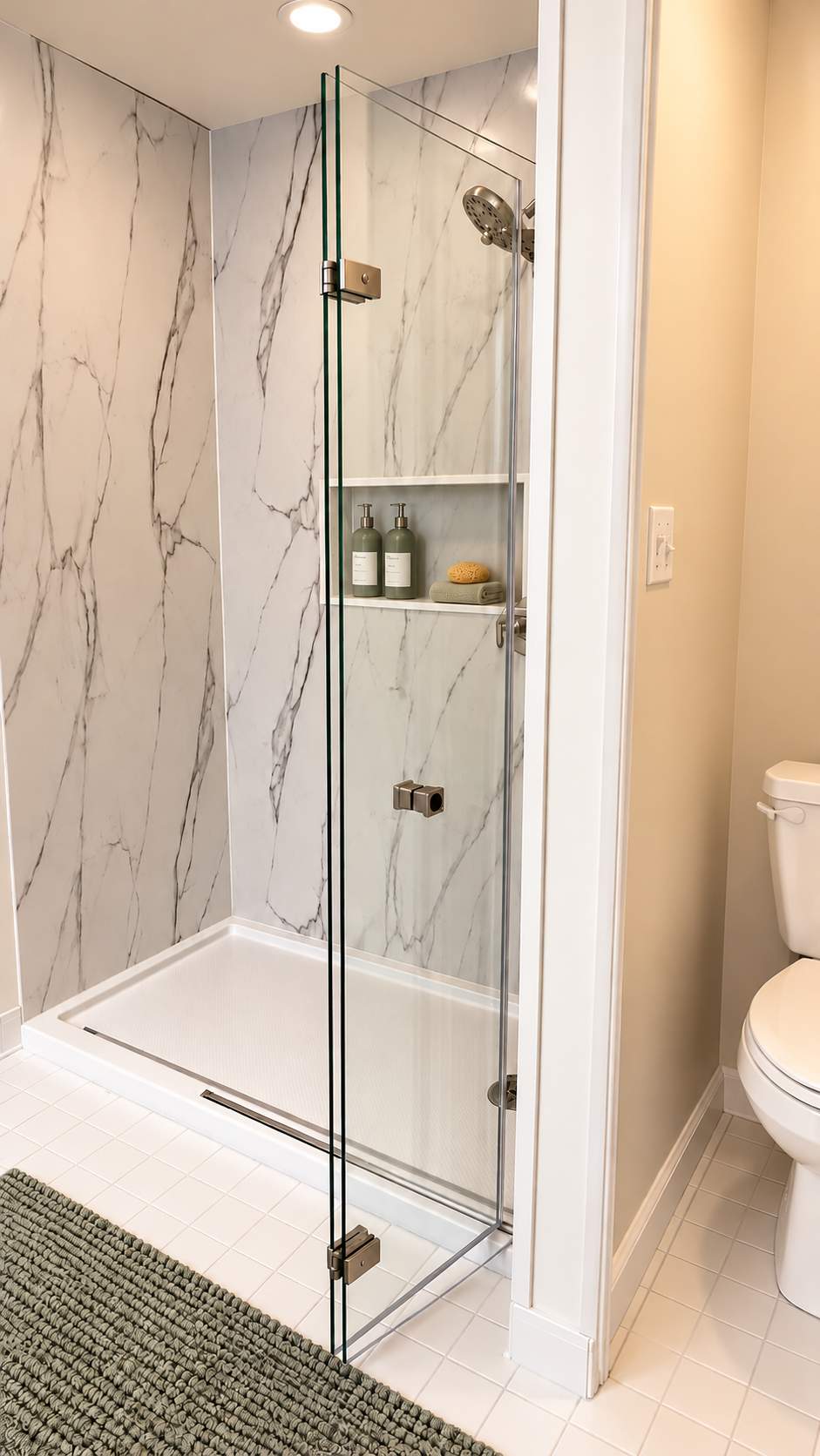Modern Walk-In Shower Remodel with Marble-Look Surround & Frameless Glass by Remodel Now