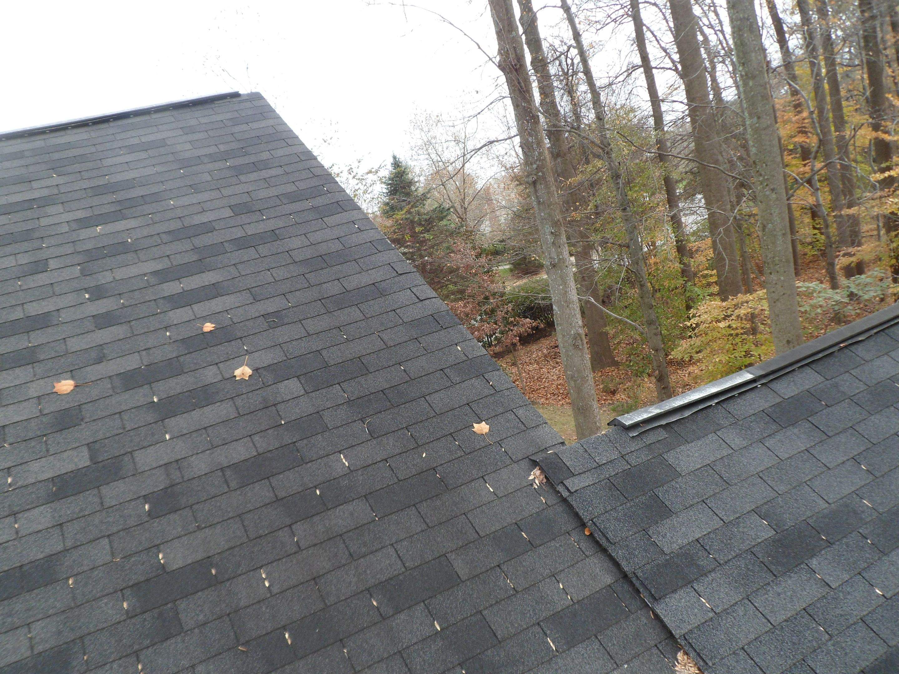 Residential Roofing Installation using Charcoal Black by Alpha Design Services