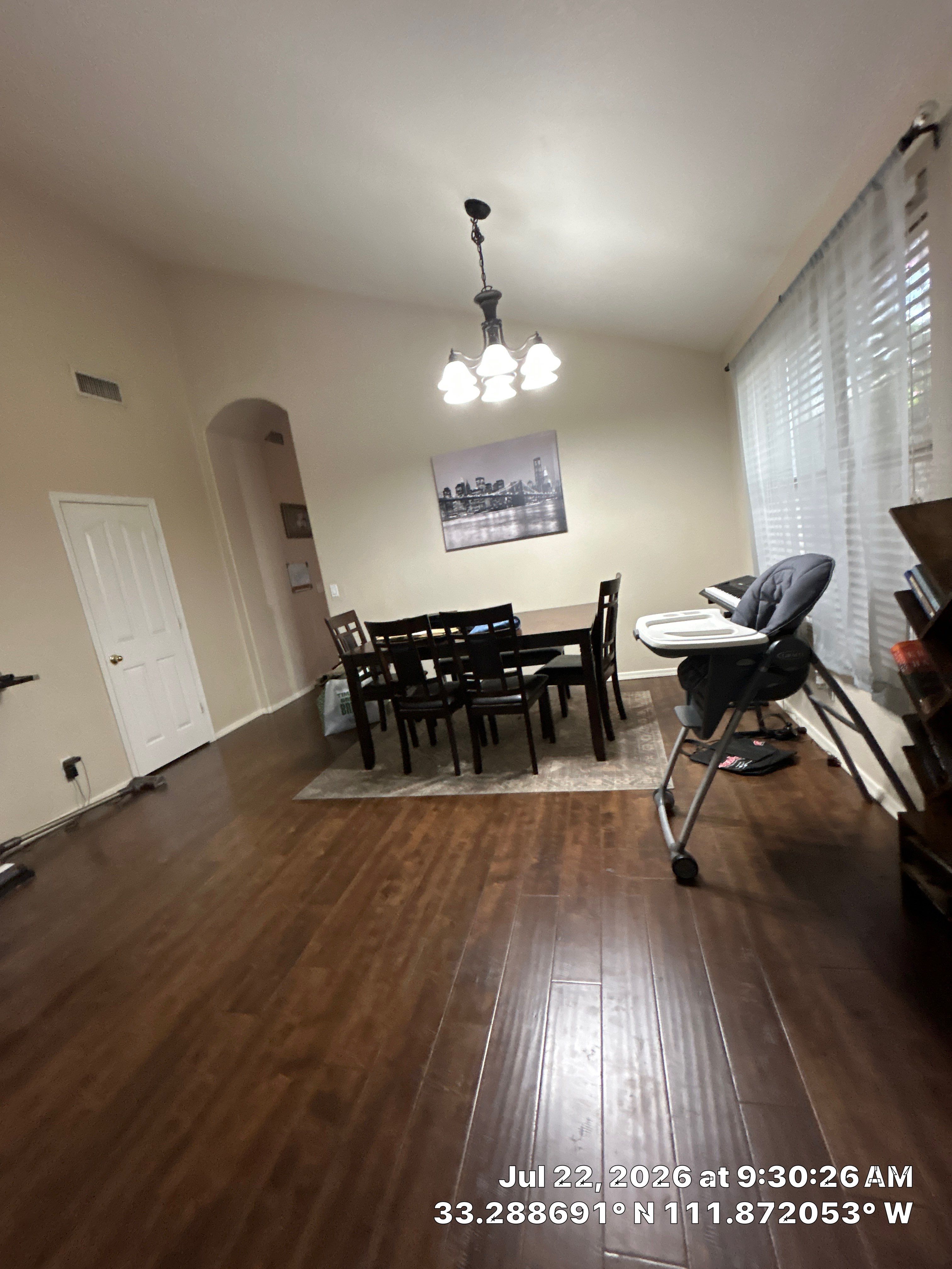 Dark Wood Floor Installation for Chandler Dining Room Renovation by CompanyCam Sales Demo