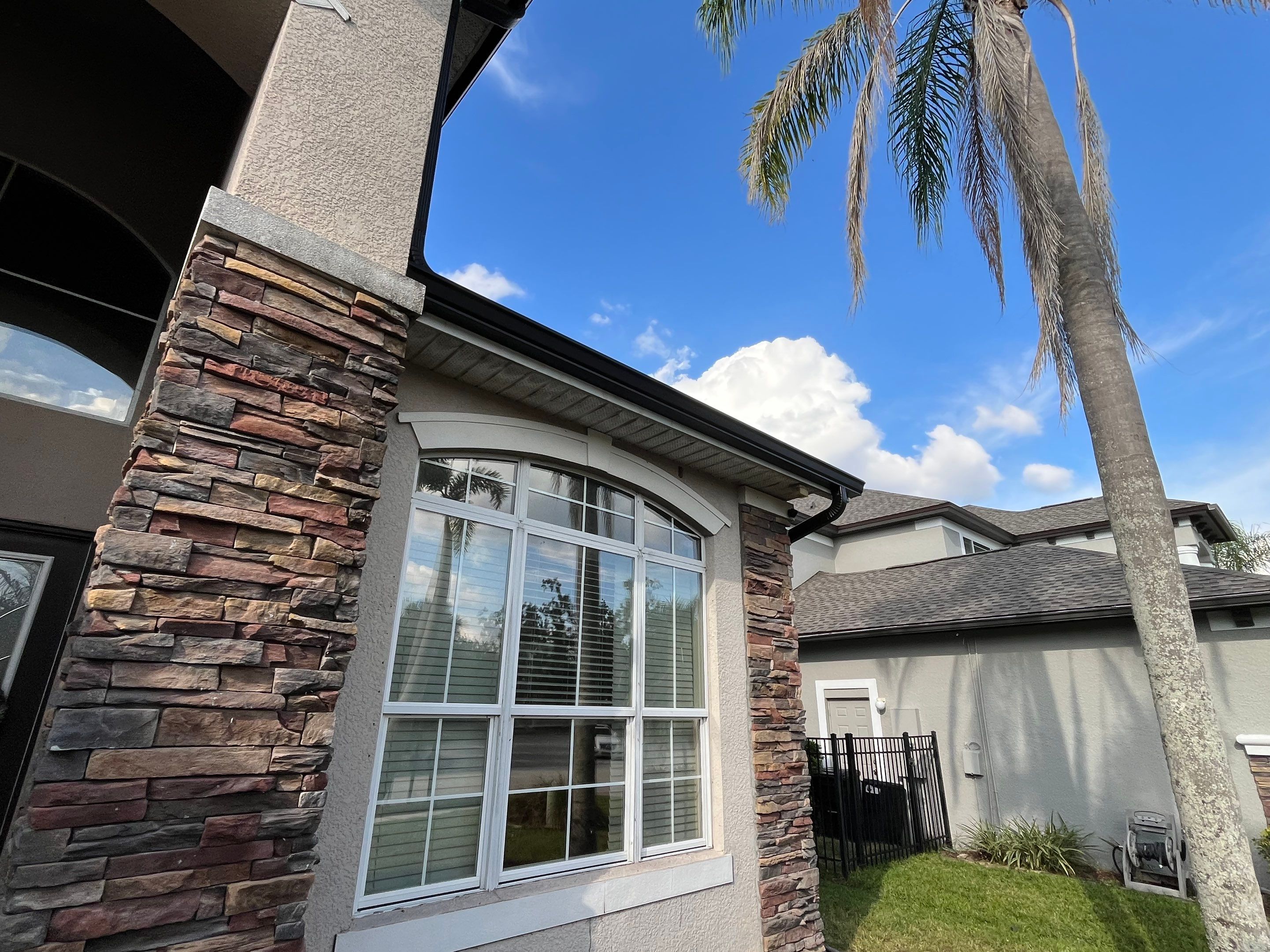 Black 6-inch Seamless Gutters for Modern Ellenton Homes FL by Gutter Professors