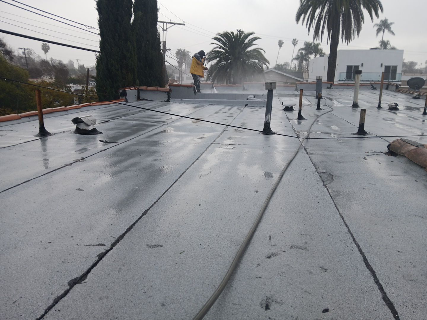Silicone Membrane Installation using American Standard Coatings Silicone-S by Hull Brothers Roofing