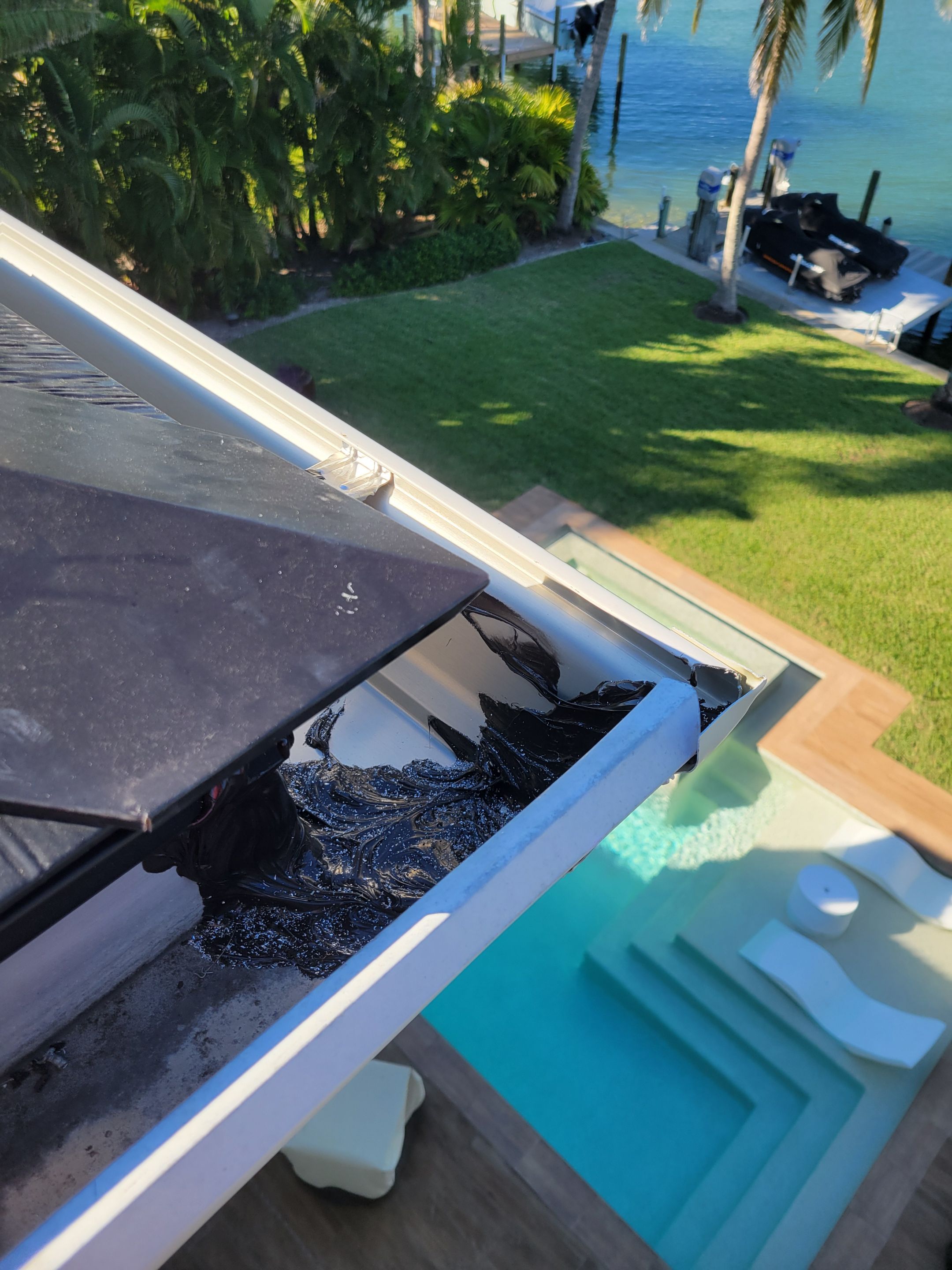 Cleaning Gutters in Sarasota FL by Gutter Professors
