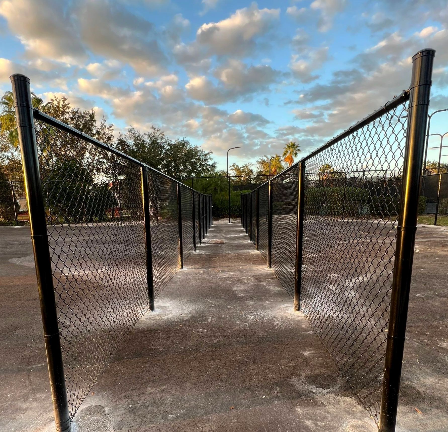 Chain-link Fence Installation using 8Ft Tall Black Chainlink Fence by Asap fence and gates, LLC