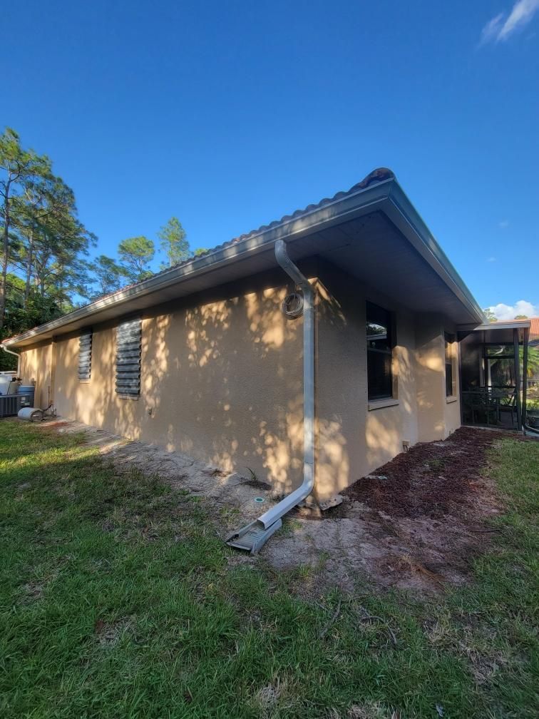 New Splash Guards and 6-Inch seamless Gutters in Naples FL by Gutter Professors