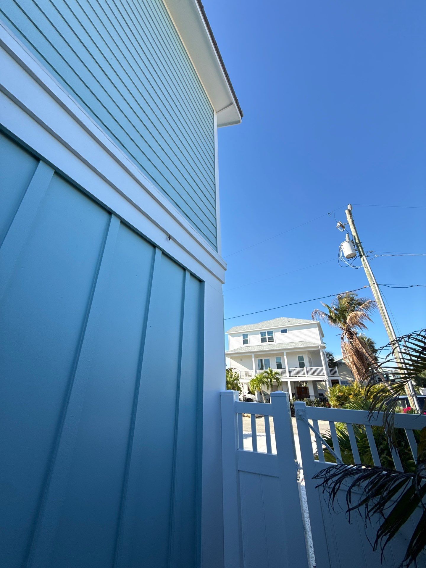 New White Seamless Gutters Installation and Downspouts, Reseal Gutters in Fort Myers Beach, FL  by Gutter Professors