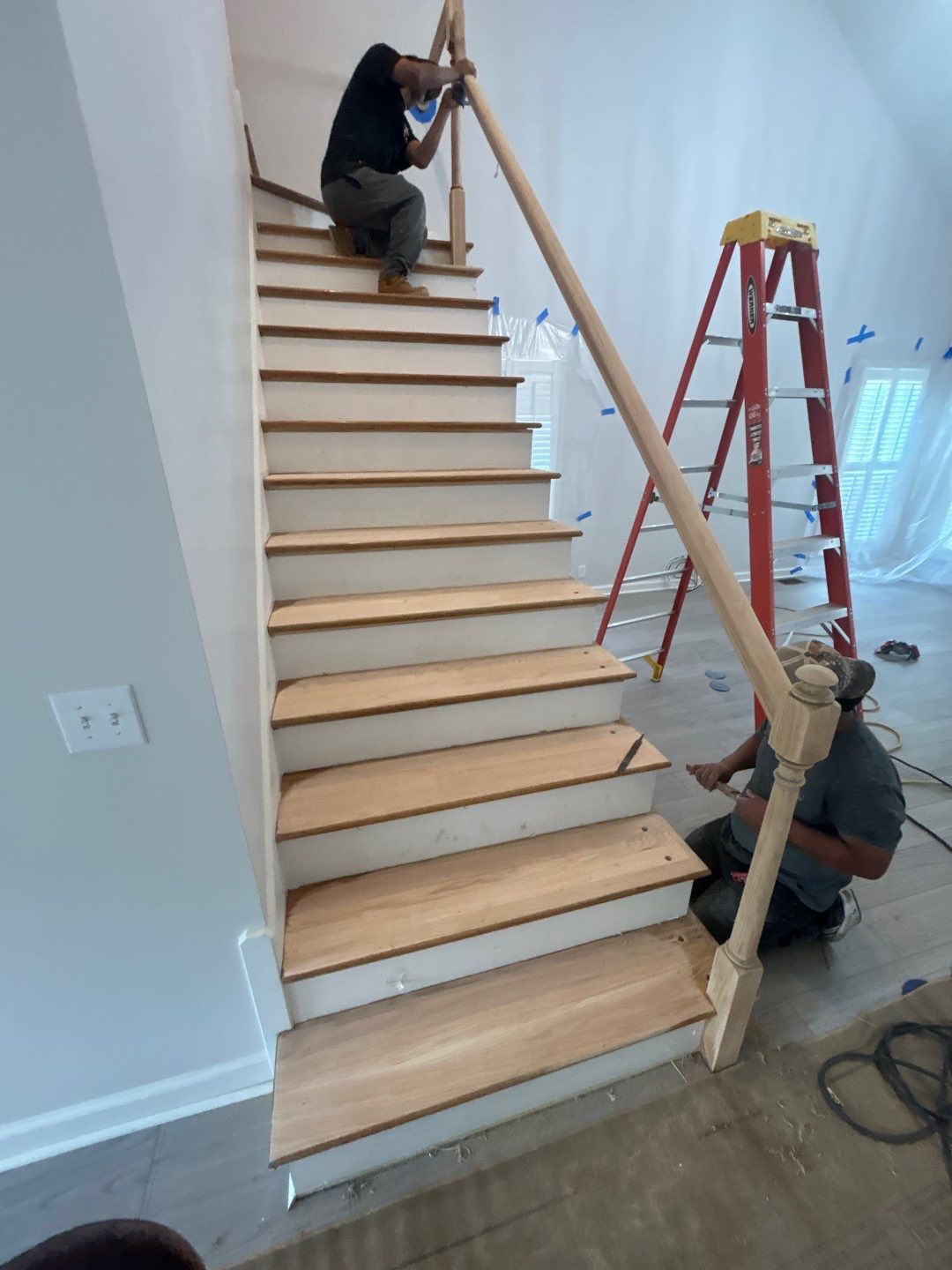 Updated staircase and hallway by Footprints Floors of Nashville