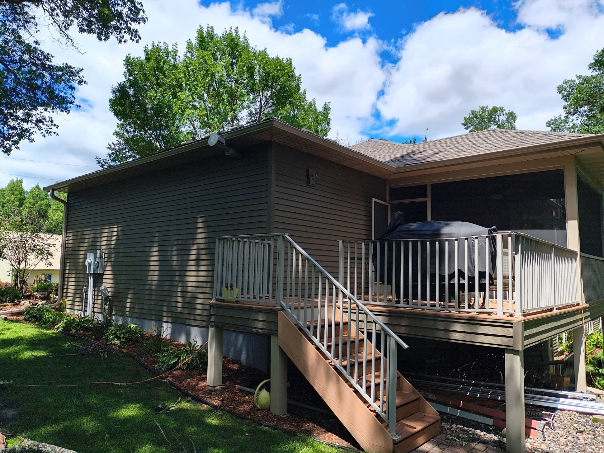 5" Seamless Gutter Installation with Leaf Exterminator Gutter Covers – Clear Lake, MN by Next Level Seamless Gutters / Exteriors Inc.