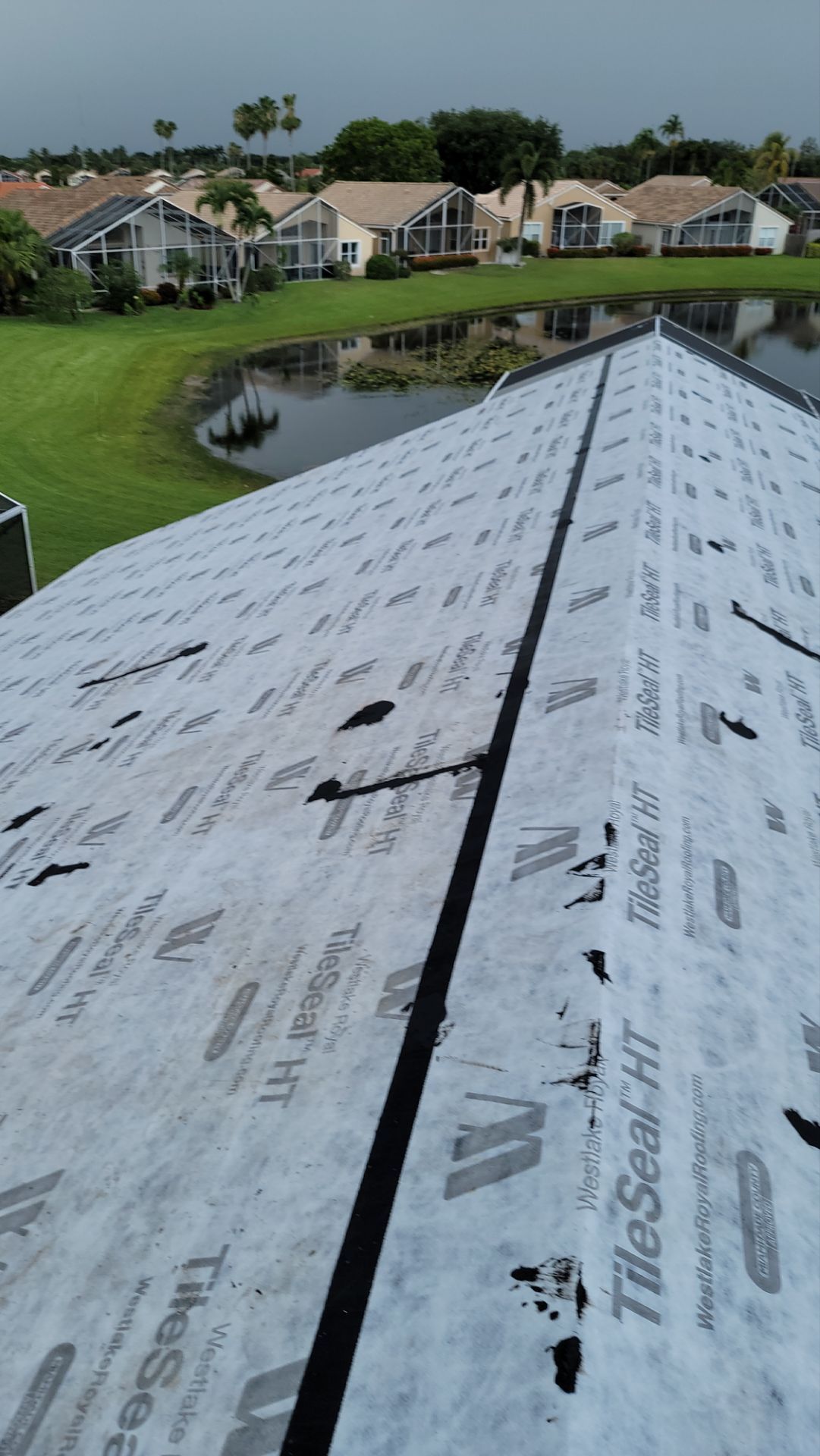 New Barrel Tile Roof Installation and Decking Repair in Boynton Beach by Aastro Roofing