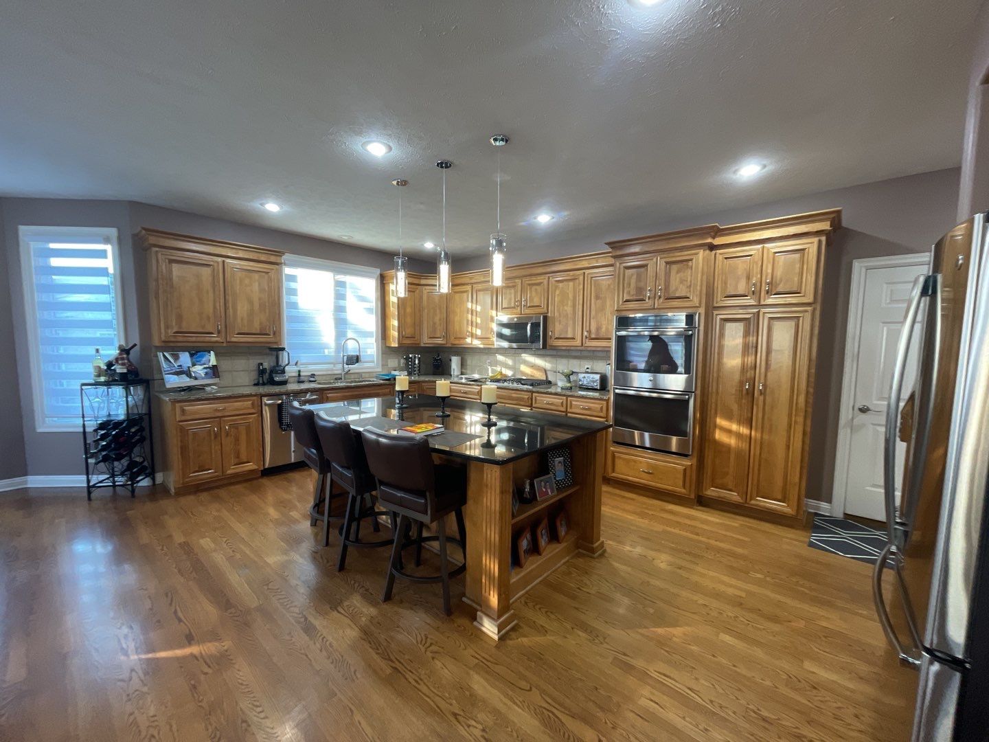 Painting Hardwood using Sherwin Williams paint by Lightning Exteriors