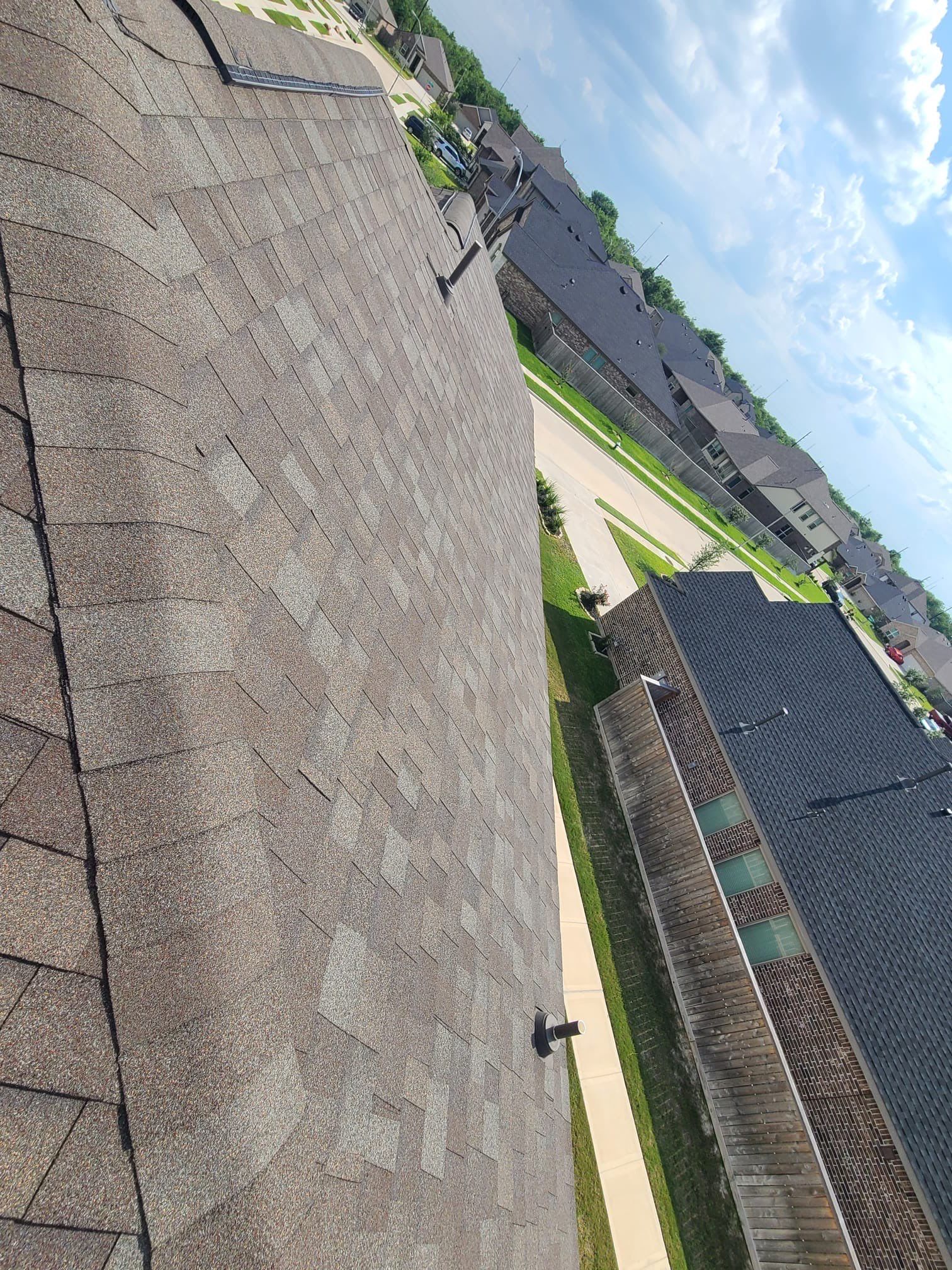 Hail Damage using Owen's Corning Duration (Lifetime) Shingles by Roof Repair Company