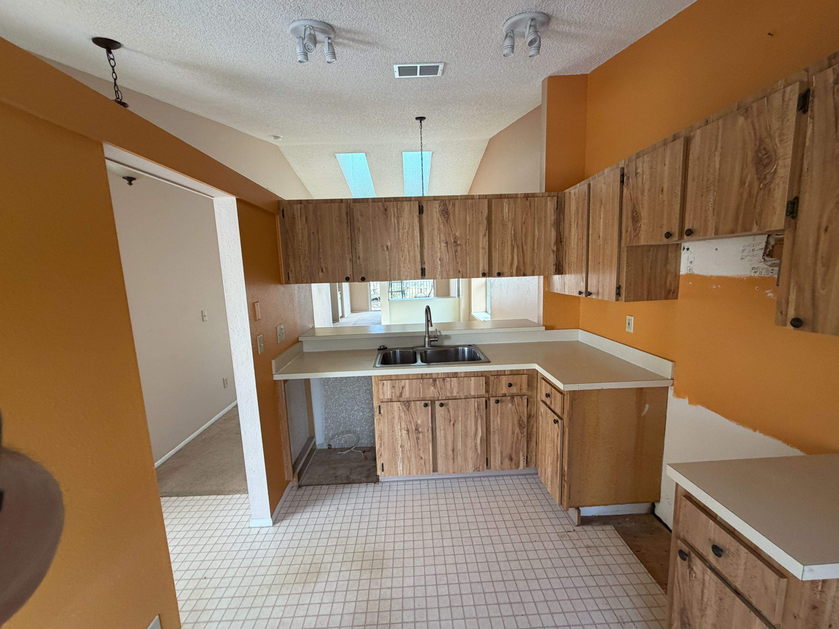 Treasure Island Interior Remodel Featuring Vaulted Ceilings and Custom Cabinetry by Vertical General Contracting