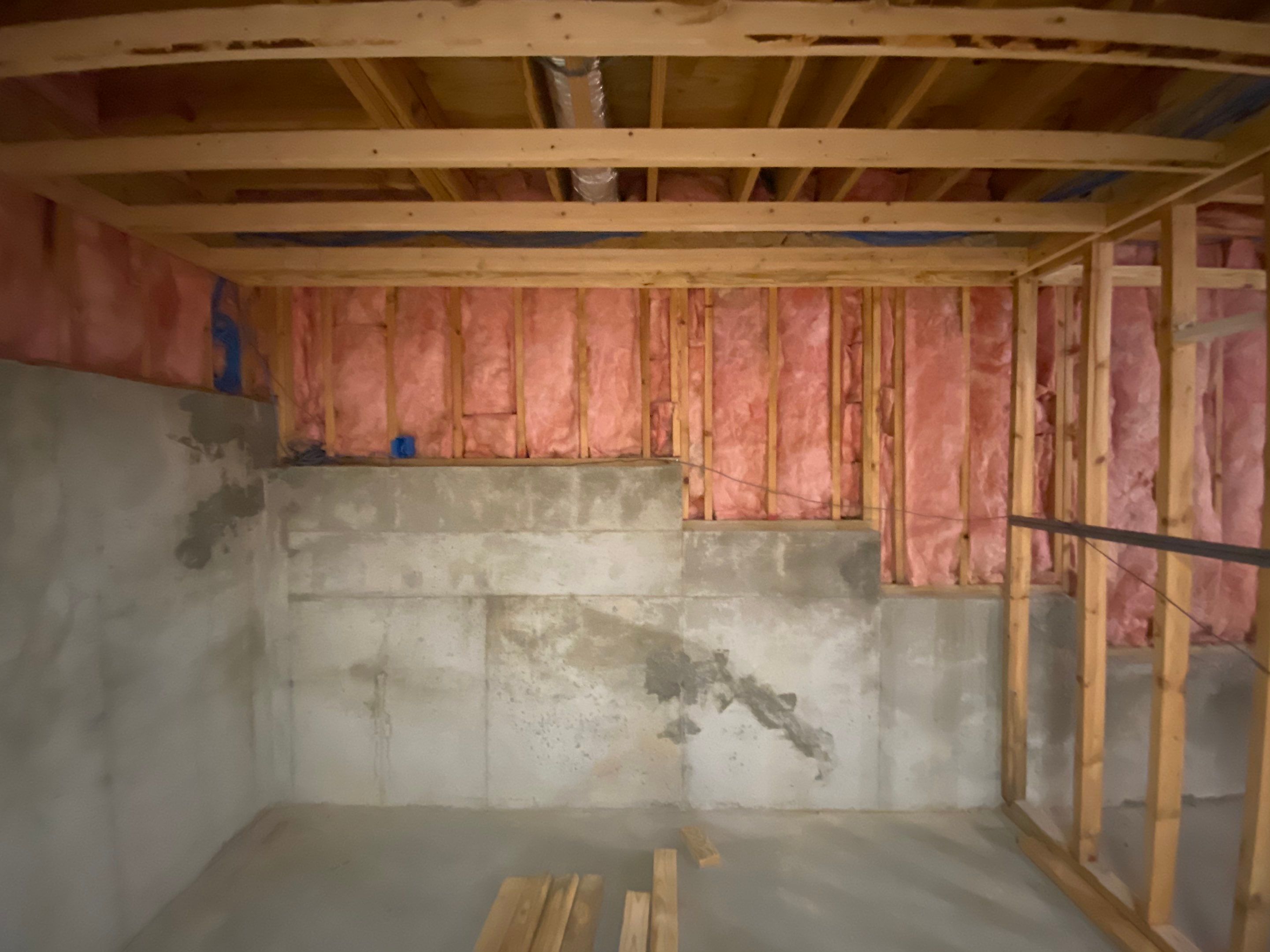 Acworth Basement Transformation With Wet Bar and Stone Fireplace by Swift Home Renovations