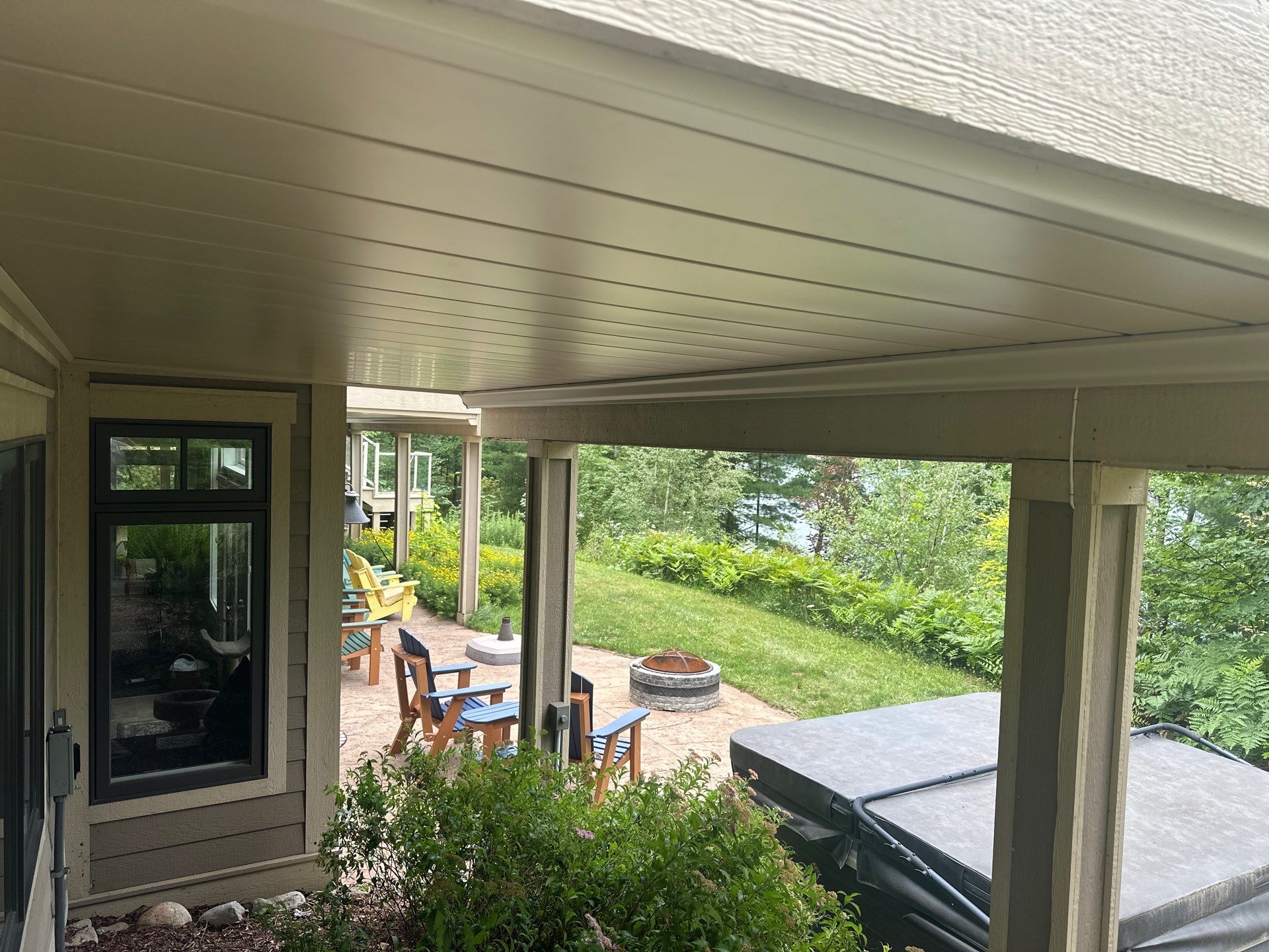 Traverse City Underdecking Installation with Integrated Seamless Gutter System by Rainbow Seamless Systems