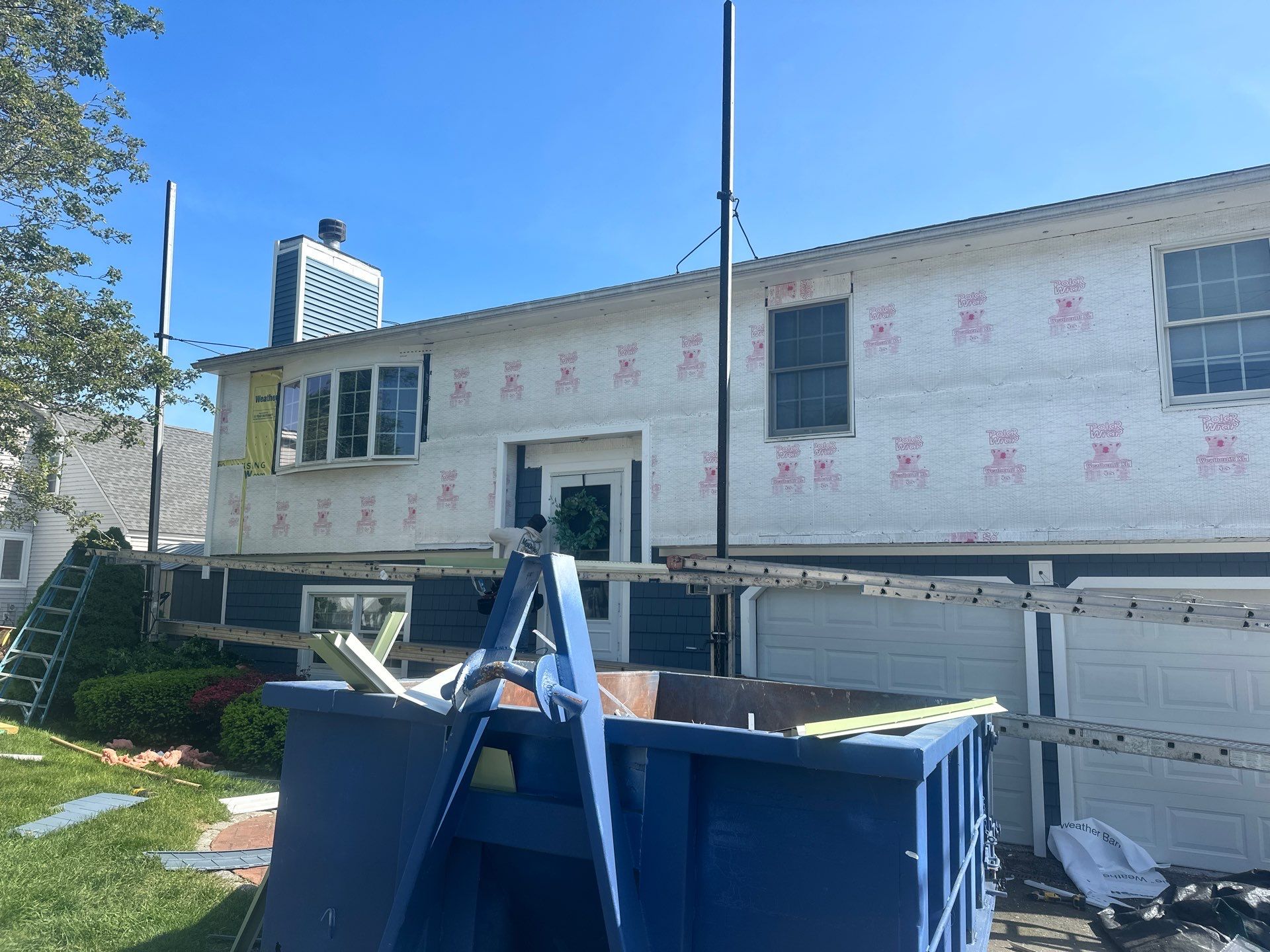 Siding Installation using Certainteed Cedar Impressions Straight Edge Perfection Shingles - D7 - Pacific Blue by A Plus Exterior