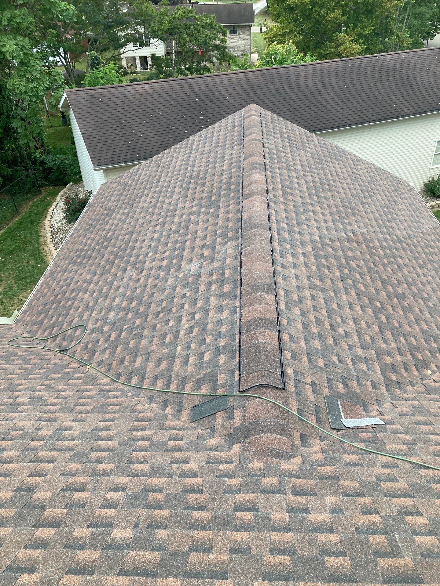 Residential Roofing Installation using GAF TImberline HDZ Hickory by Rainstoppers Roofing
