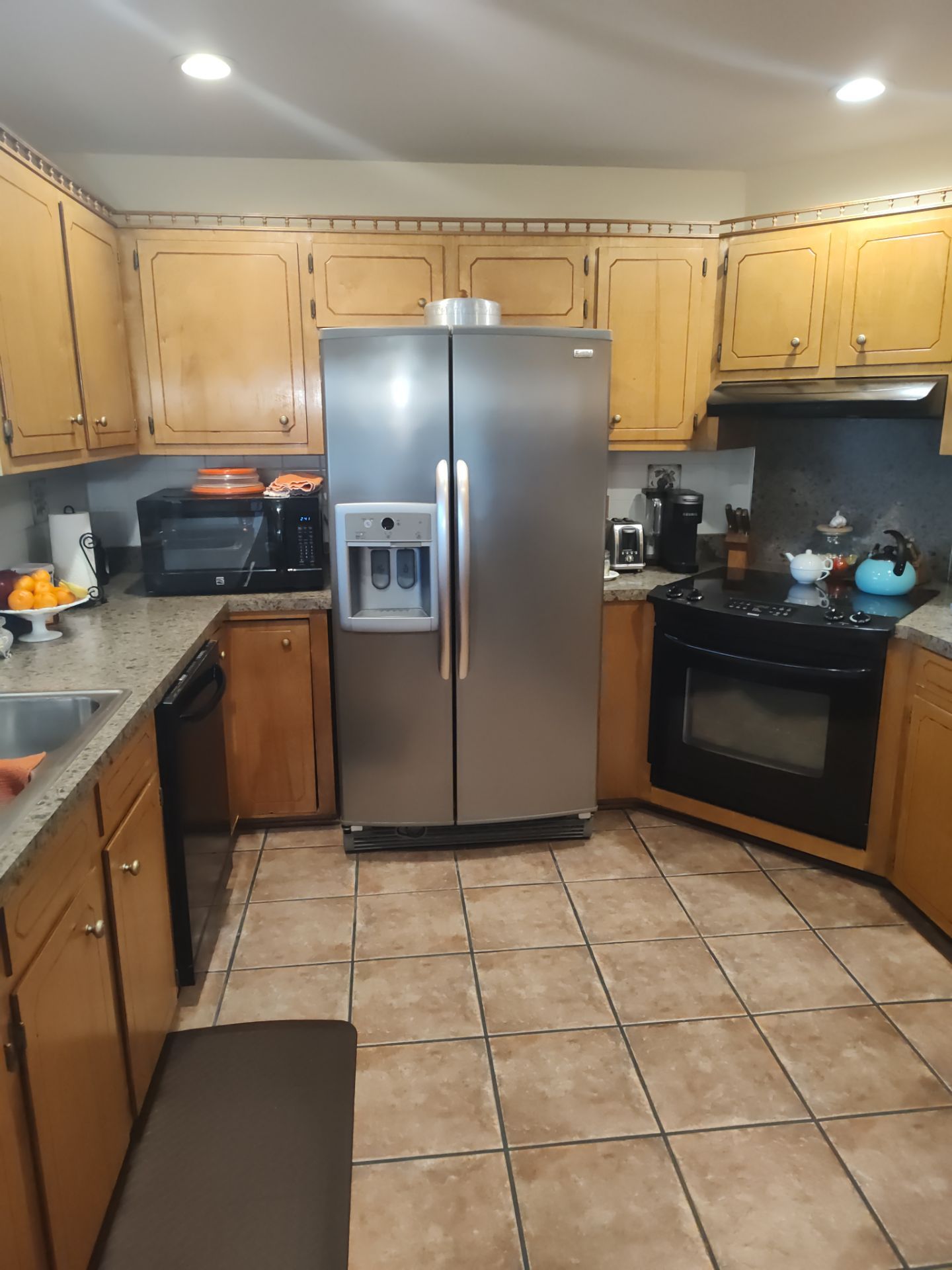 Remodel Kitchen refinishing cabinets by Cornerstone Home Builders, LLC