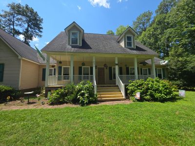 Front Porch Deck Resurfacing and Wood Stair Installation in Battleboro