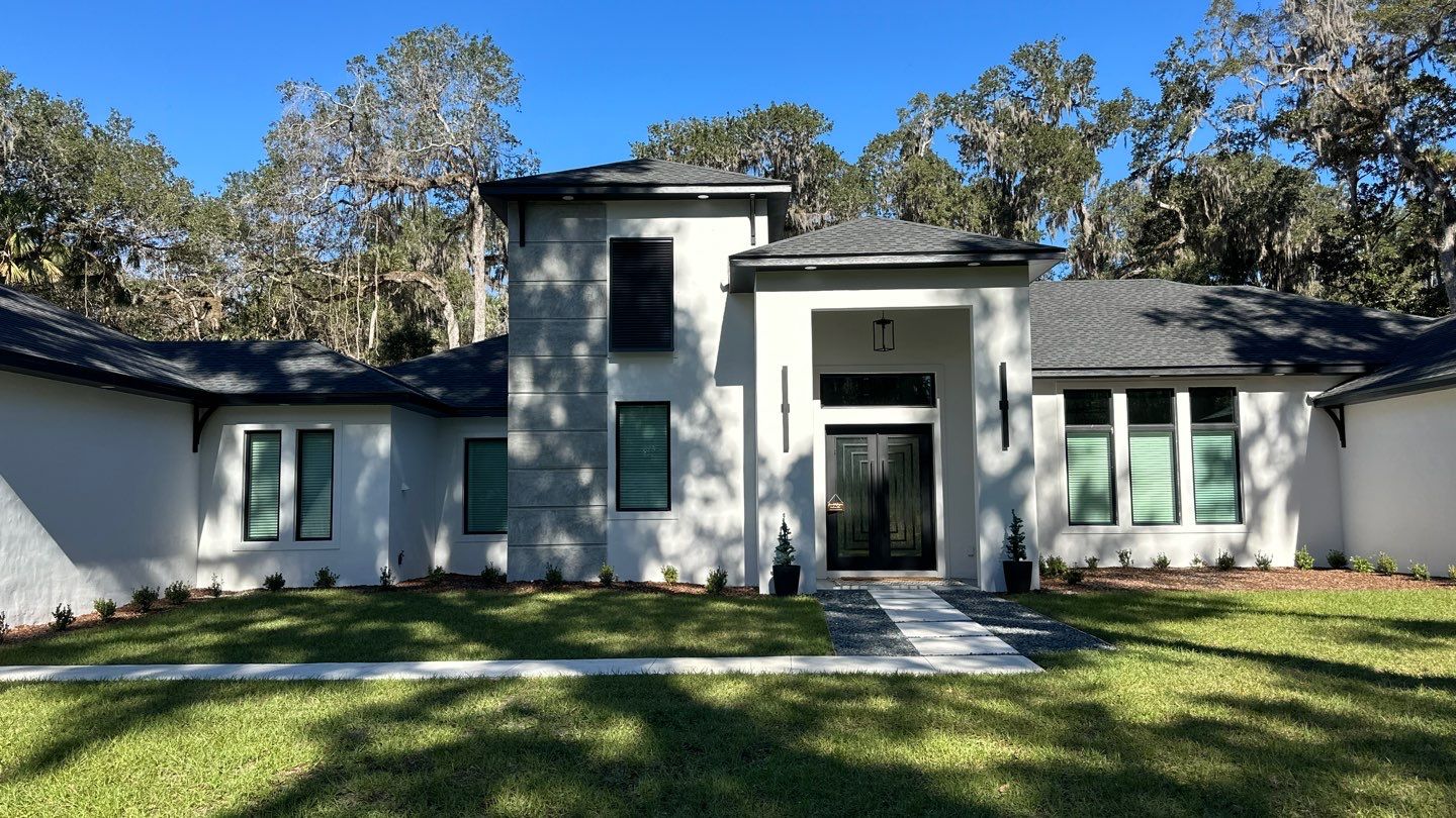 Bahama Shutters in Signal Black  by Smart Guard Shutters