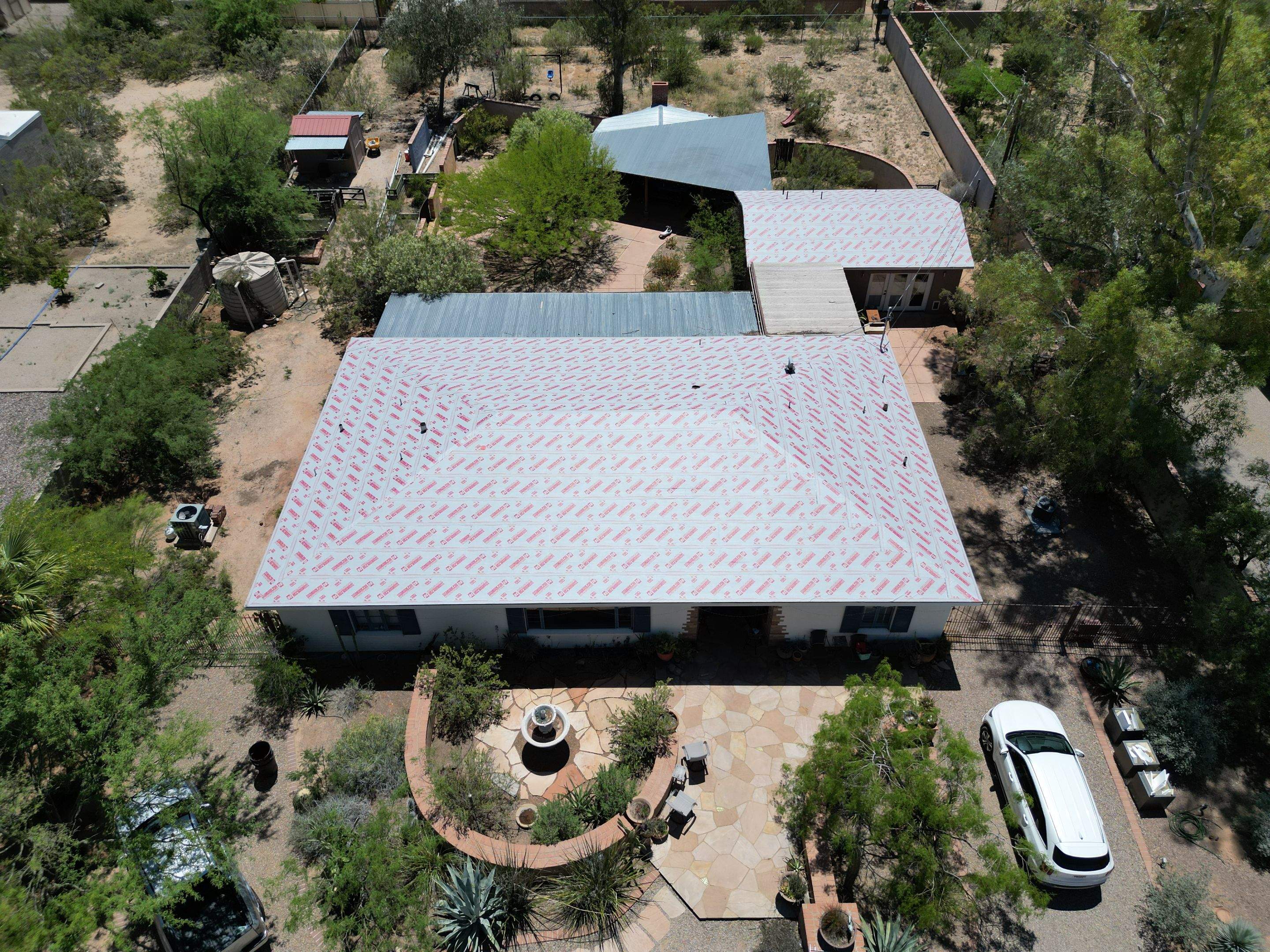 Light Stone Exposed Fastener by Reimagine Roofing