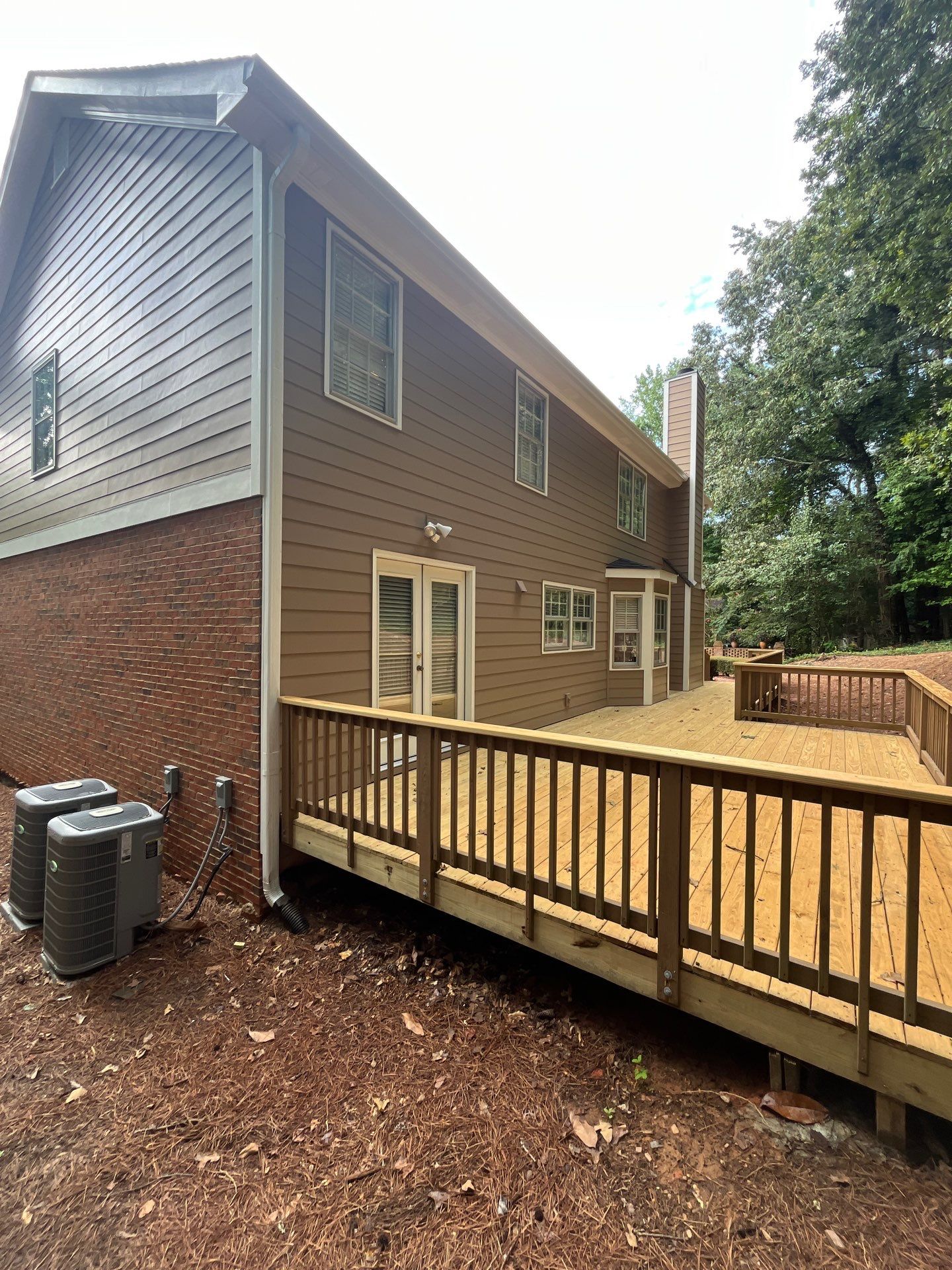 James Hardie Siding Installation, Rotten Wood Replacement, Porch Repairs, and Deck Resurfacing in Smyrna, GA by Nelson Exteriors 