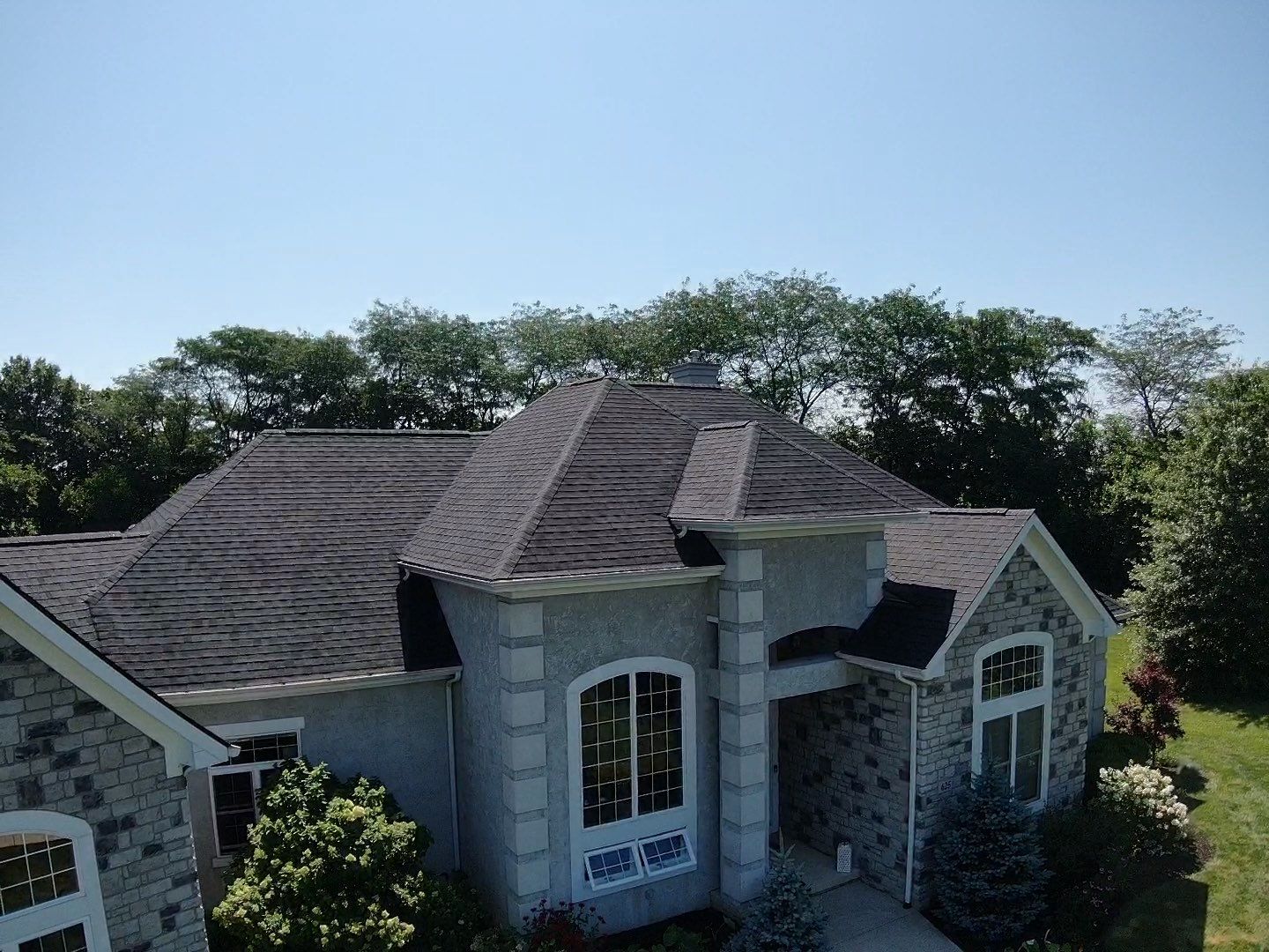 Residential Roofing Installation using Atlas Pinnacle Black Shingles by 614 Exteriors